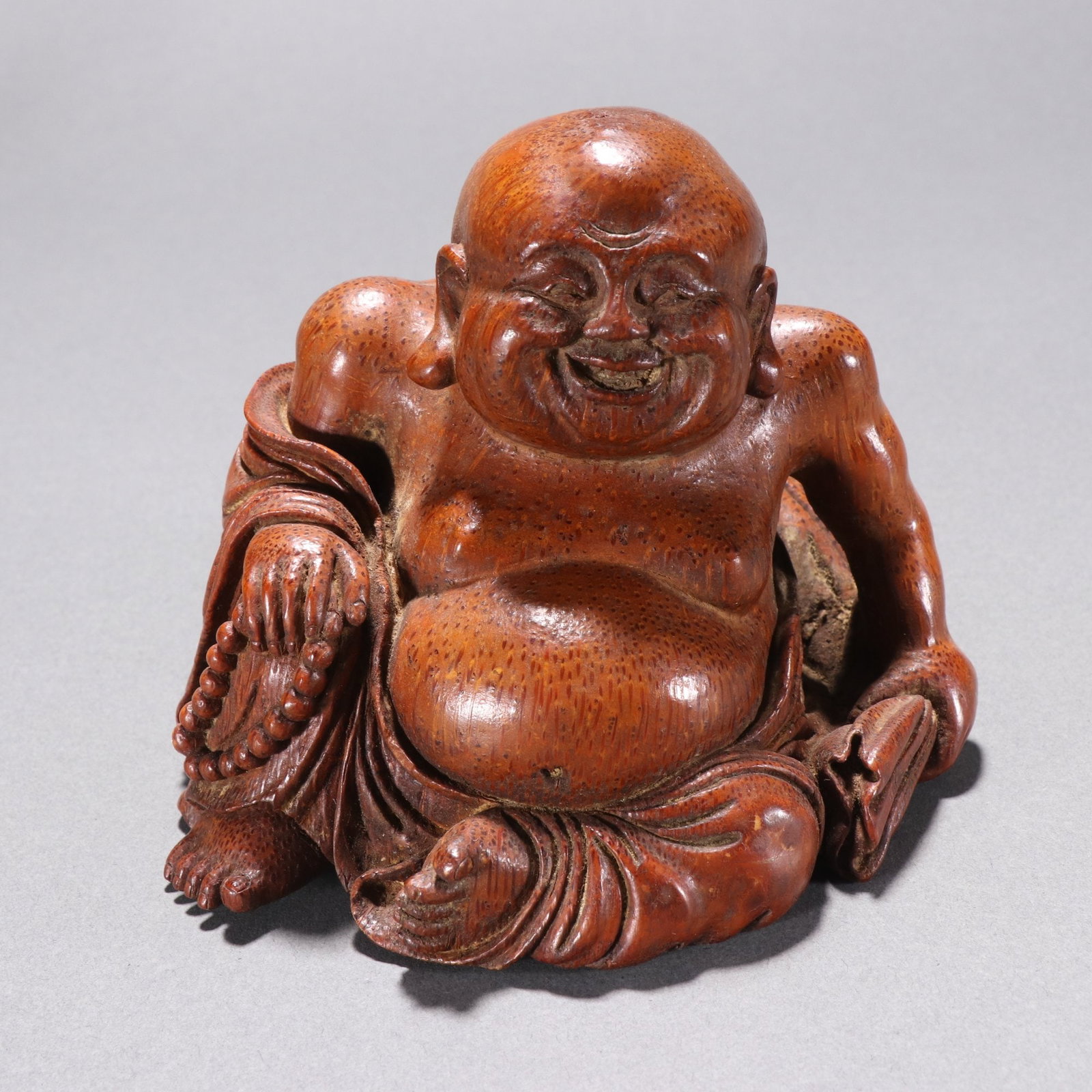 An Exquisite Bamboo Arhat Ornament: An Exquisite Bamboo Arhat Ornament,Qing Dynasty, China,With Mark,Size:4.1inx4.5in,Weight:45g 竹雕罗汉摆件,中国清代,带款
