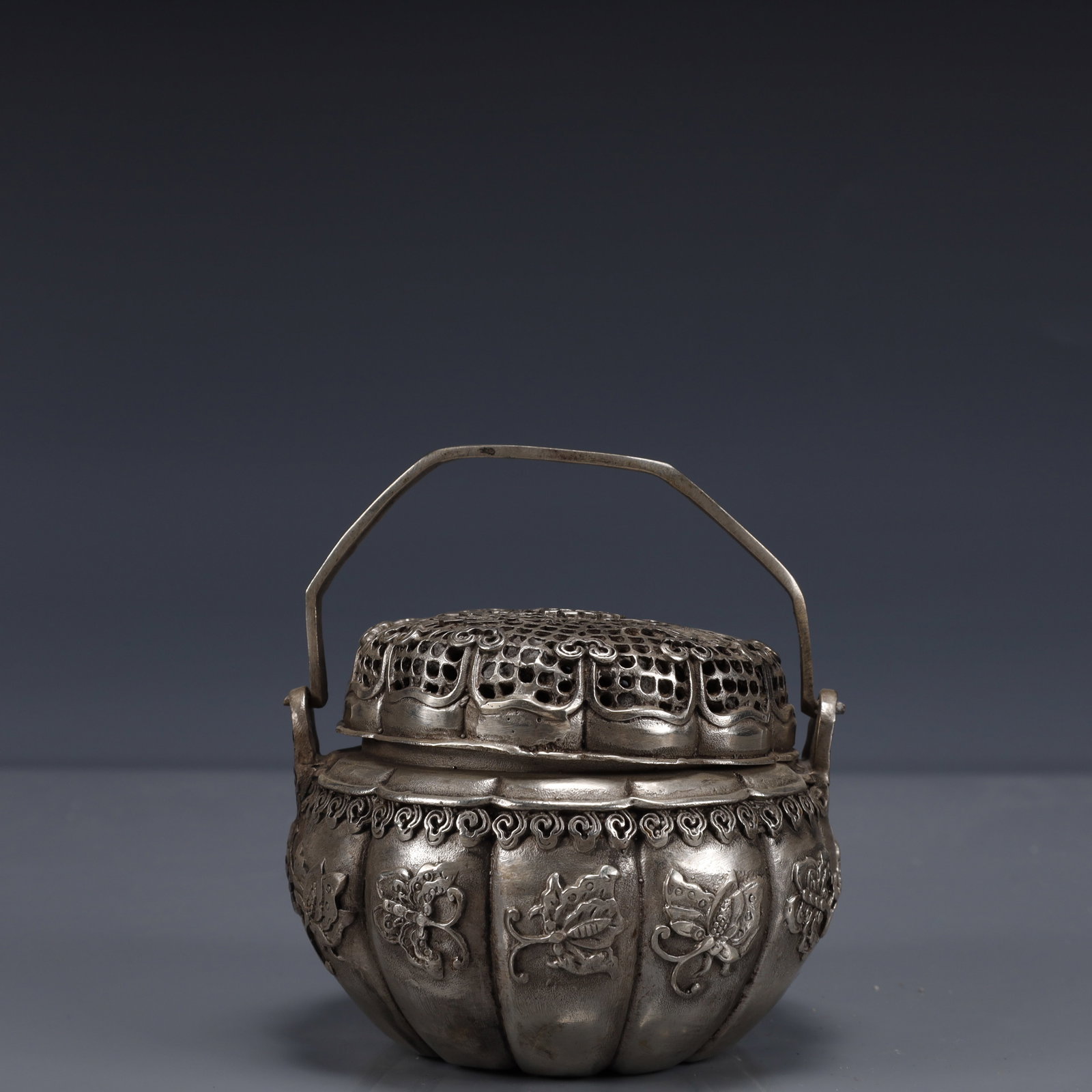 An Exquisite Silver-Plated Bronze Butterfly Pattern Handwarmer: An Exquisite Silver-Plated Bronze Butterfly Pattern Handwarmer ,Ming Dynasty, China,Size:4.3inx3.5inx4.1in,Weight:500g 铜镀银蝴蝶纹手炉,中国