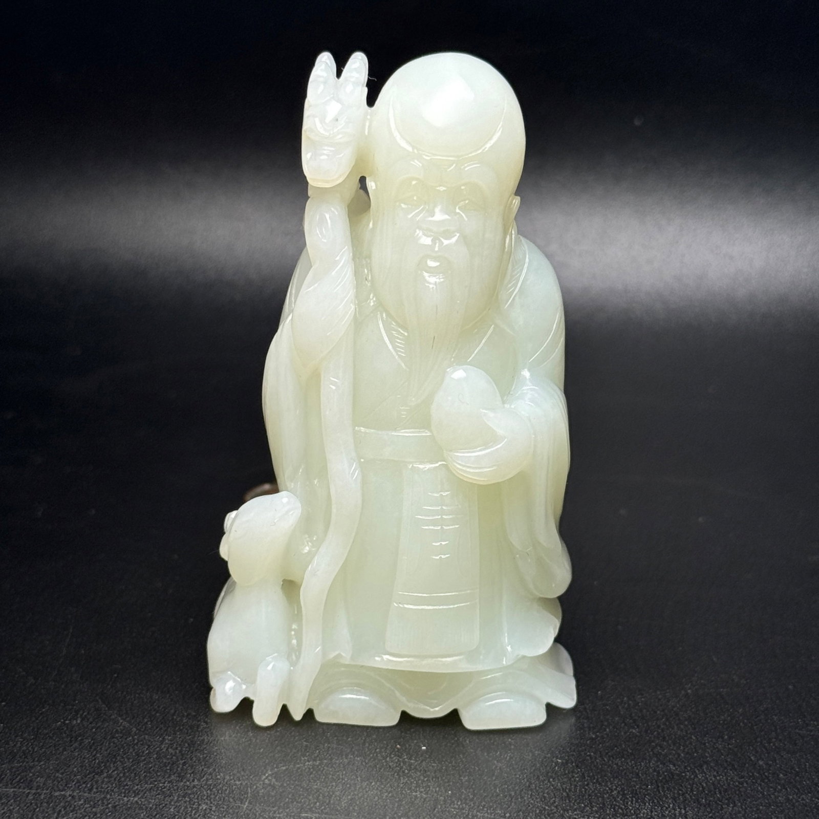 An Exquisite White Jade Figure Ornament: An Exquisite White Jade Figure Ornament,Qing Dynasty,China,Size:91mmx52mmx34mm,Weight:216g 白玉人物摆件,中国清代