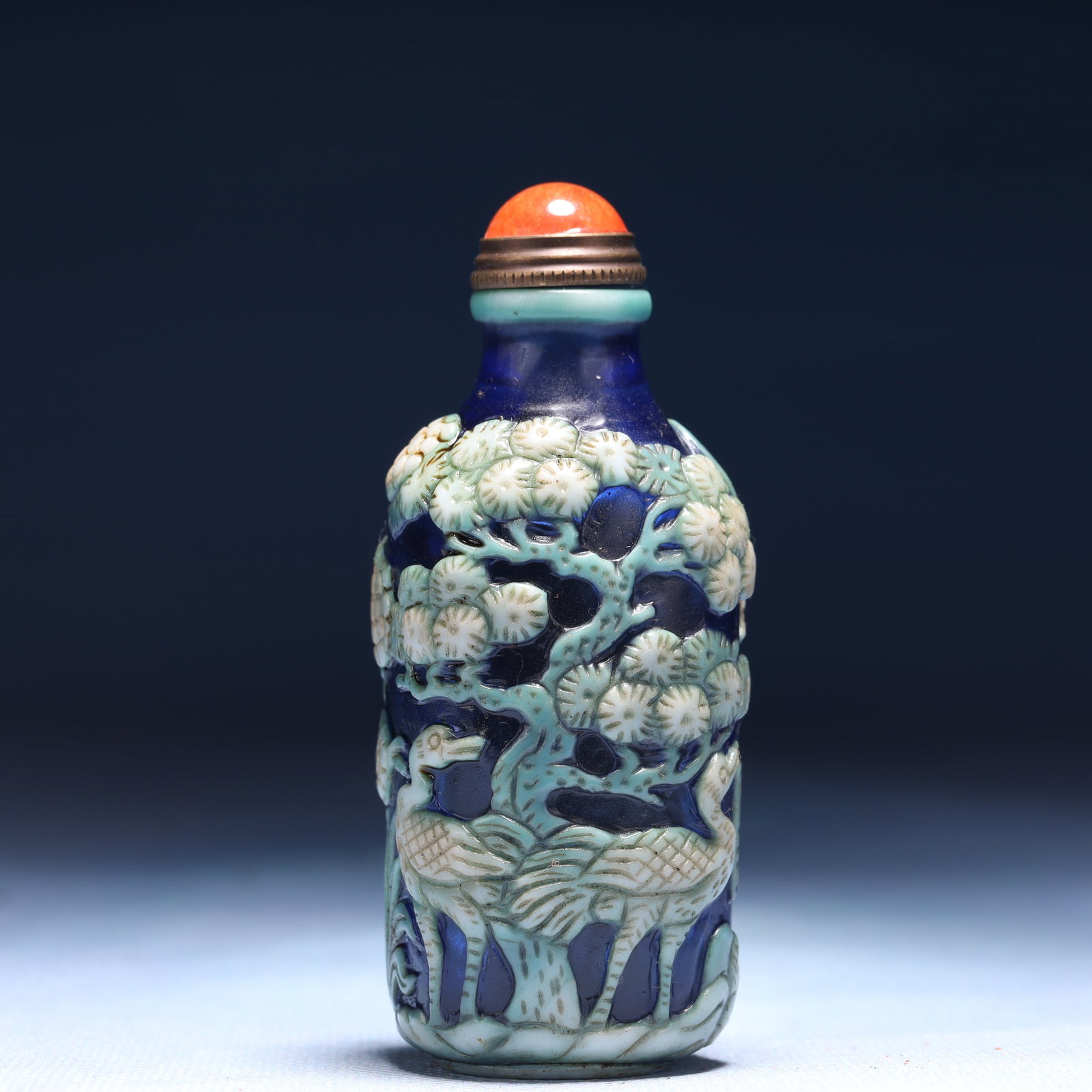 An Exquisite Glass Pine and Crane Pattern Snuff Bottle: An Exquisite Glass Pine and Crane Pattern Snuff Bottle,Qing Dynasty,China,Daoguang Four-character Mark,Size:1.4inx3.3in,Weight:98g
