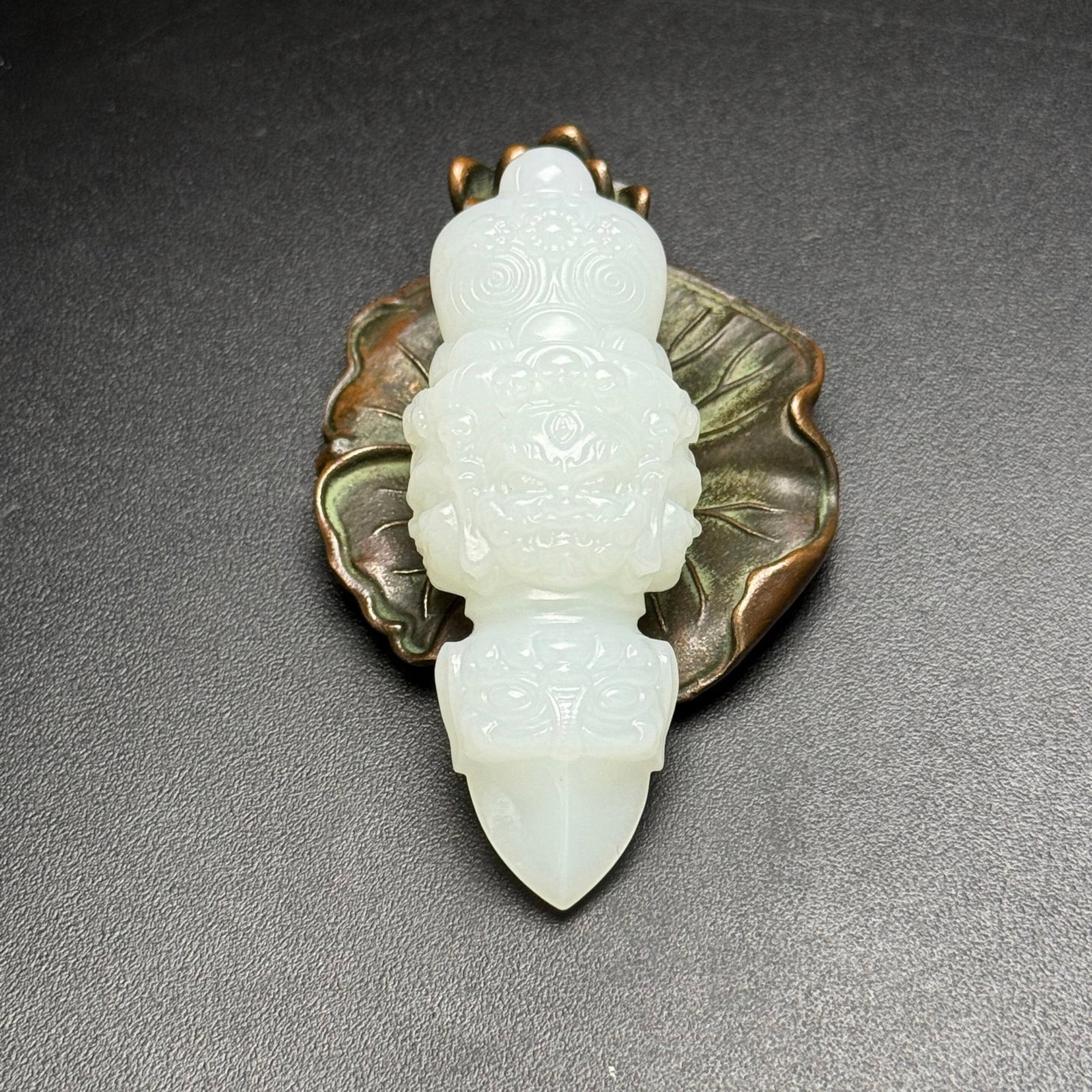 An Exquisite White Jade Beast-Face Pattern Ritual Implement: An Exquisite White Jade Beast-Face Pattern Ritual Implement,Qing Dynasty,China,Size:26mmx67mmx19mm,Weight:39g 白玉兽面纹法器,中国清代