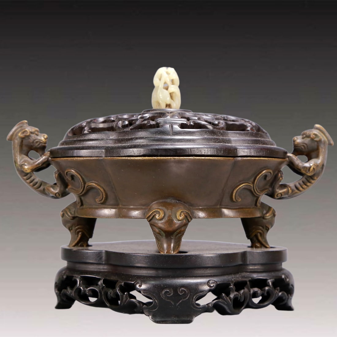 An Archaic Bronze Dragon-Ears and Elephant-legs Censer,with Zitanwood Cover: An Archaic Bronze Dragon-Ears and Elephant-legs Censer,with Zitanwood Cover,Qing Dynasty, China,Size:7.9inx5.1inx5.7in,Weight:1500g 铜龙耳象足香炉,配