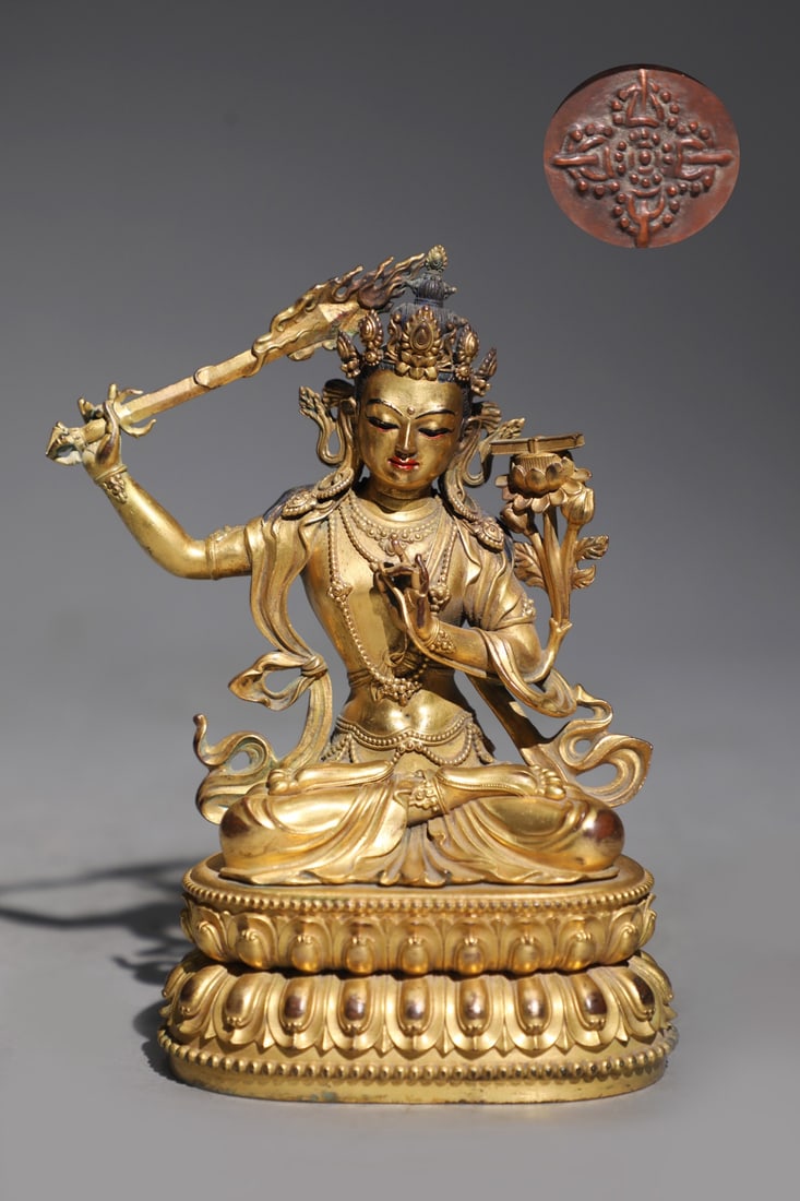 A Solemn Gilt Bronze Statue of Manjusri: A Solemn Gilt Bronze Statue of Manjusri,Ming Dynasty,China,Size:6inx3.9in,Weight:700g 铜鎏金文殊菩萨像,中国明代