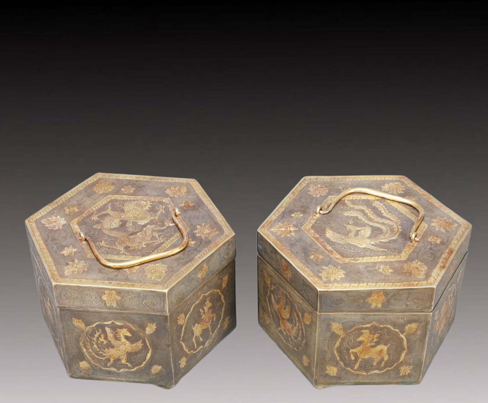 A Pair of Rare Gilt Silver Auspicious Beast Pattern Cover Jars: A Pair of Rare Gilt Silver Auspicious Beast Pattern Cover Jars,Tang Dynasty, China,Size:7.7inx8.7in,Weight:4700g