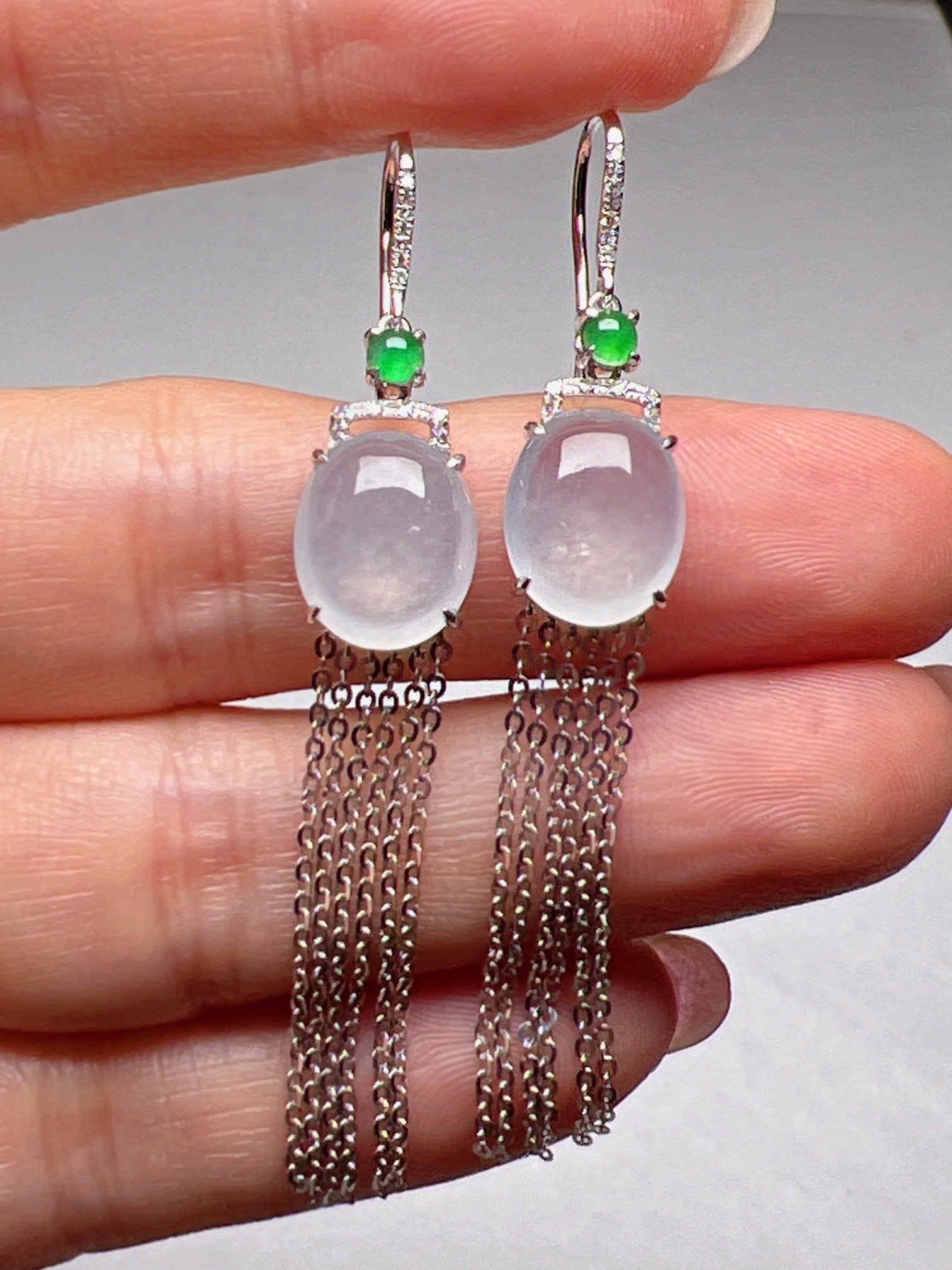 A Pair of Exquisite 18k Gold Diamond Inlaid Jadeite Earrings: A Pair of Exquisite 18k Gold Diamond Inlaid Jadeite Earrings,Size(Loose Stone):10.2mmx8.7m 一对18k金钻镶嵌翡翠耳环