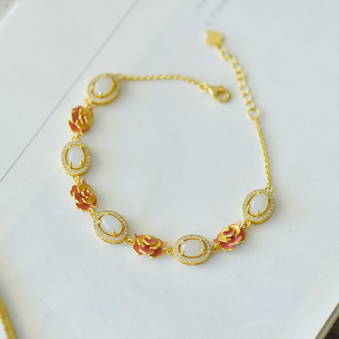 An Exquisite Sterling Silver-Gold Plated Inlaid White Jade Enamel Bracelet: An Exquisite Sterling Silver-Gold Plated Inlaid White Jade Enamel Bracelet,Size:5mmx7mm 纯银镀金镶白玉珐琅手链