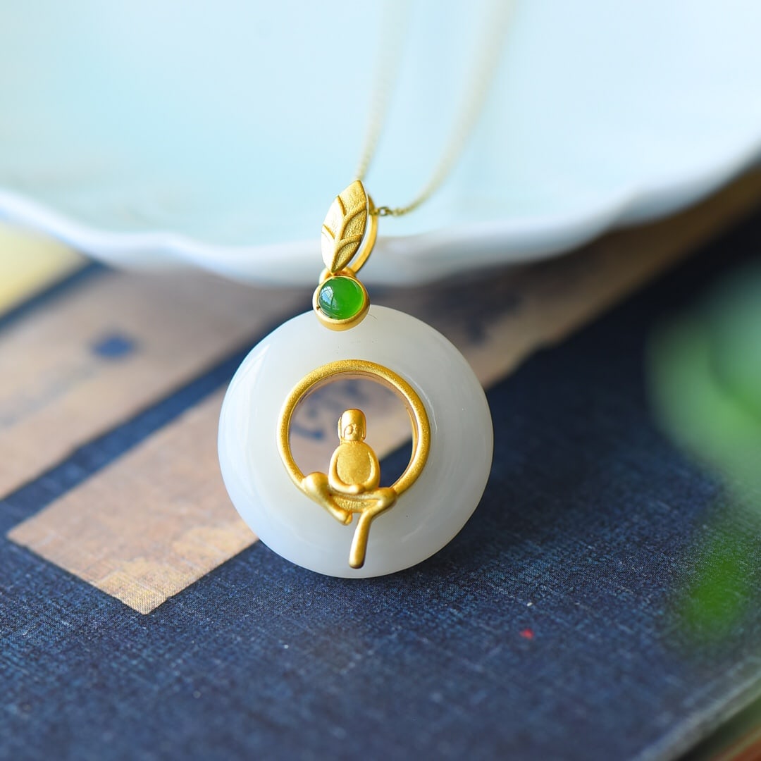 An Exquisite Sterling Silver-Gold Plated Inlaid White Jade Necklace: An Exquisite Sterling Silver-Gold Plated Inlaid White Jade Necklace,Size:20mmx29mm 纯银镀金镶白玉项链