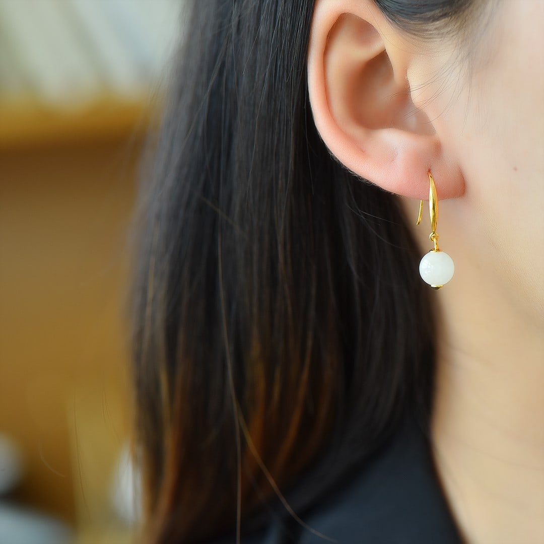 A Pair of Exquisite Sterling Silver-Gold Plated Inlaid White Jade Earrings: A Pair of Exquisite Sterling Silver-Gold Plated Inlaid White Jade Earrings,Size:8mmx8mm 一对纯银镀金镶白玉耳环