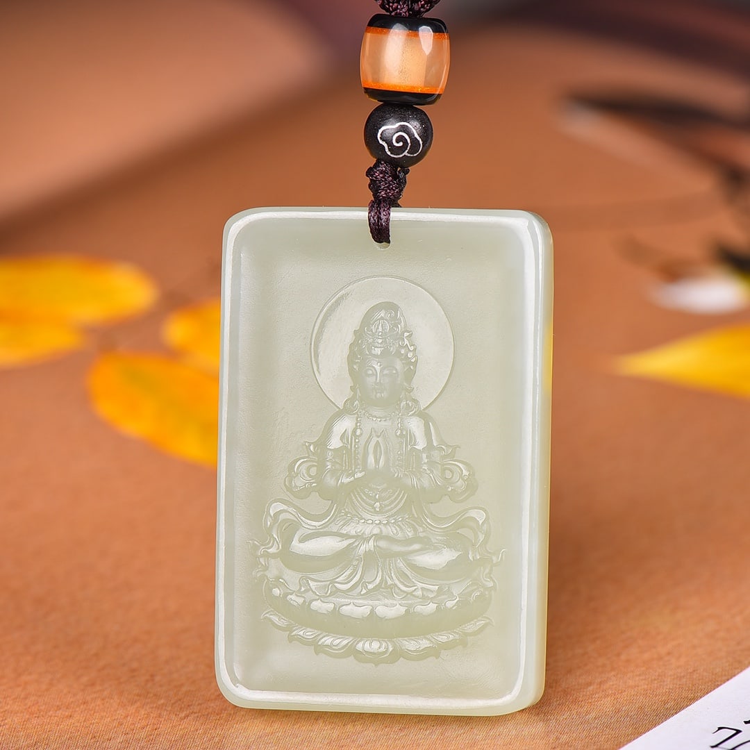 An Exquisite Greenish Jade Statue of Avalokitesvara Pendant: An Exquisite Greenish Jade Statue of Avalokitesvara Pendant,Size:30mmx45mm 青玉观音像挂件