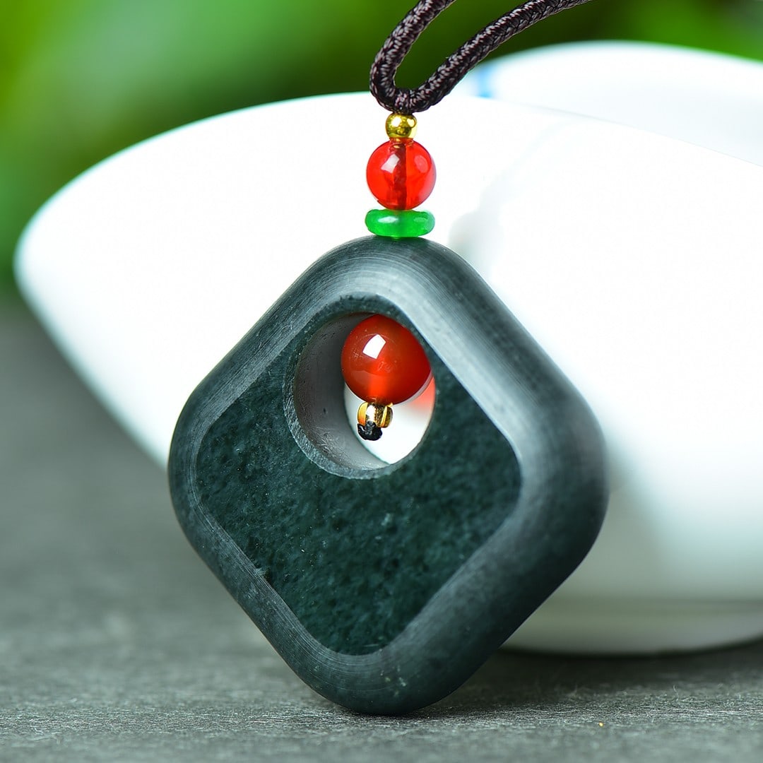An Exquisite Sapphire Hollow Pendant: An Exquisite Sapphire Hollow Pendant,Size:41mmx41mm (寓意)吉祥 如意 青玉镂空挂件