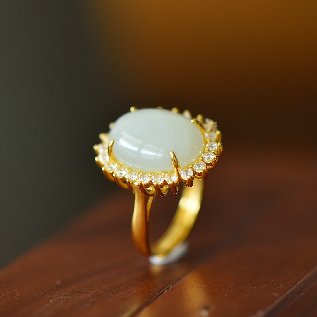 An Exquisite Sterling Silver-Gold Plated Inlaid White Jade Ring,Inlaid Diamond: An Exquisite Sterling Silver-Gold Plated Inlaid White Jade Ring,Inlaid Diamond,Size:12mmx16mm 纯银镀金镶白玉戒指,嵌钻石
