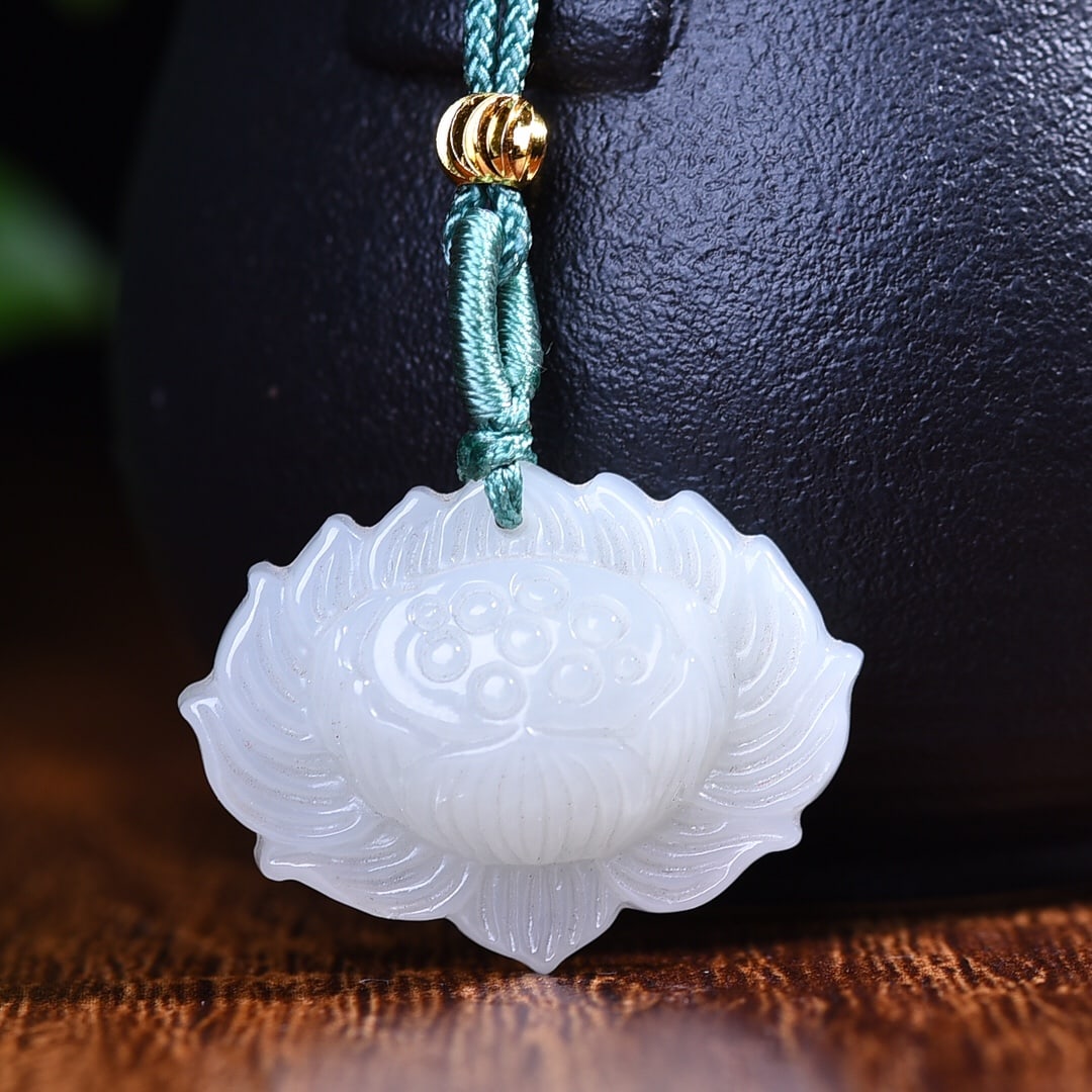 An Exquisite White Jade Lotus Pendant: An Exquisite White Jade Lotus Pendant,Size:29mmx22mm 白玉莲花挂件