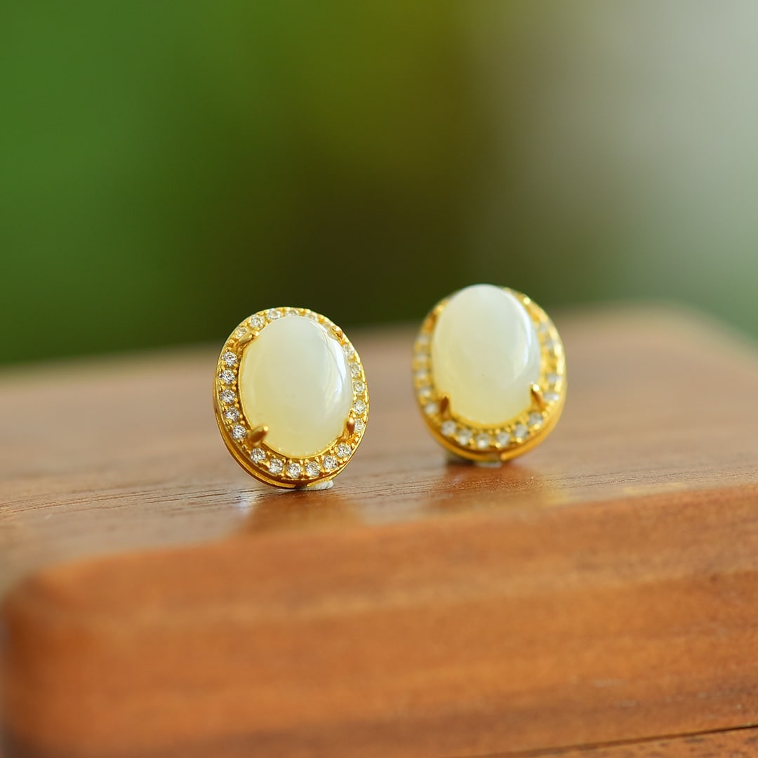 A Pair of Exquisite Sterling Silver-Gold Plated Inlaid White Jade Earrings: A Pair of Exquisite Sterling Silver-Gold Plated Inlaid White Jade Earrings, 一对纯银镀金镶白玉耳钉