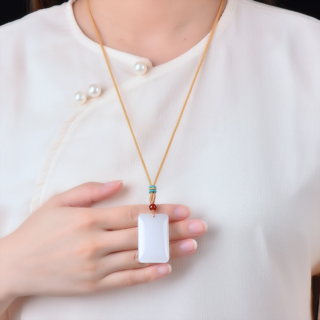 An Exquisite White Jade Pendant: An Exquisite White Jade Pendant,Size:25mmx40mm 白玉挂件