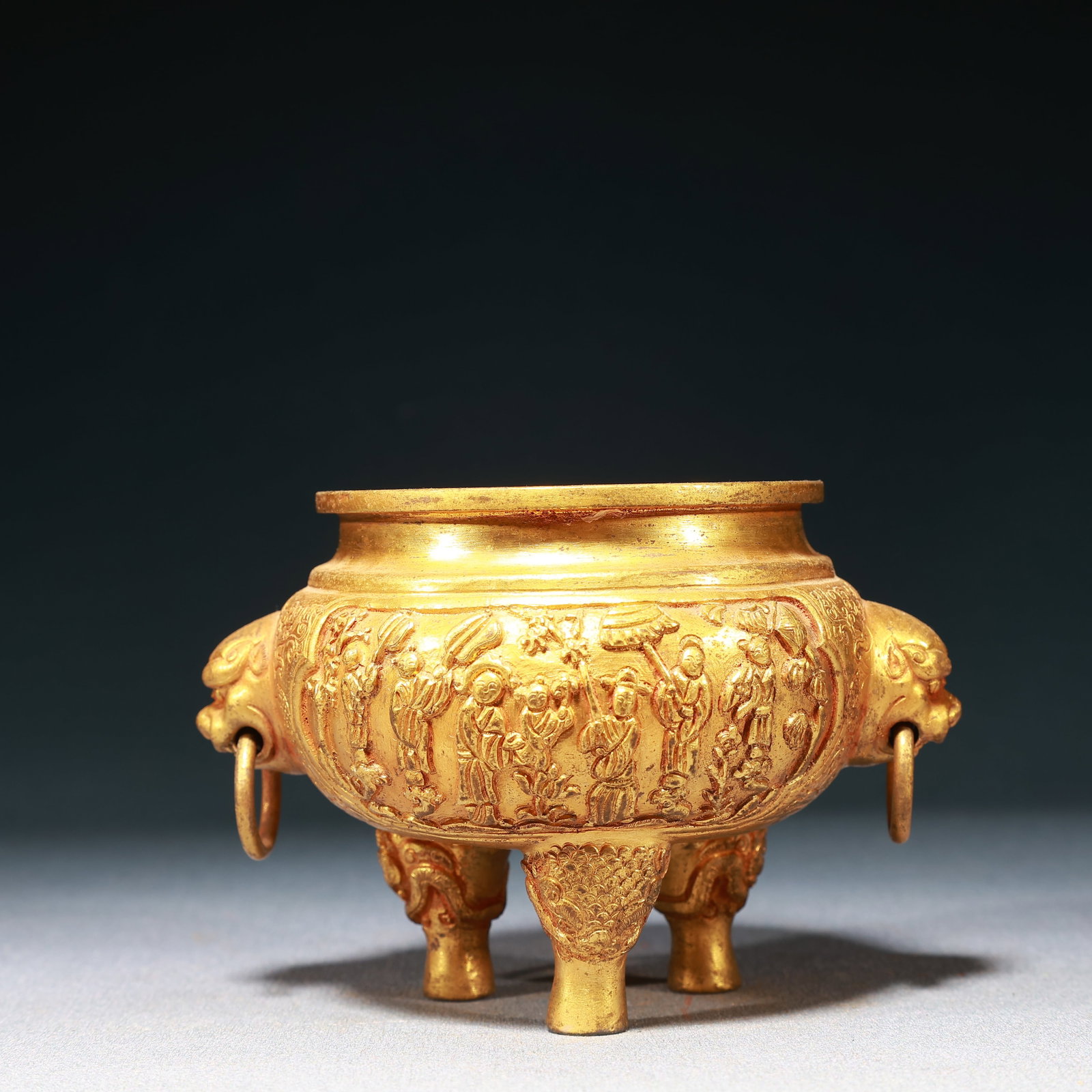 An Exquisite Gilt Bronze Character and Story Pattern Beast-Ears Tripod Censer: An Exquisite Gilt Bronze Character and Story Pattern Beast-Ears Tripod Censer,Qing Dynasty,China,Size:4.7inx3.7inx3.5in,Weight:300g 铜鎏金人物故事纹