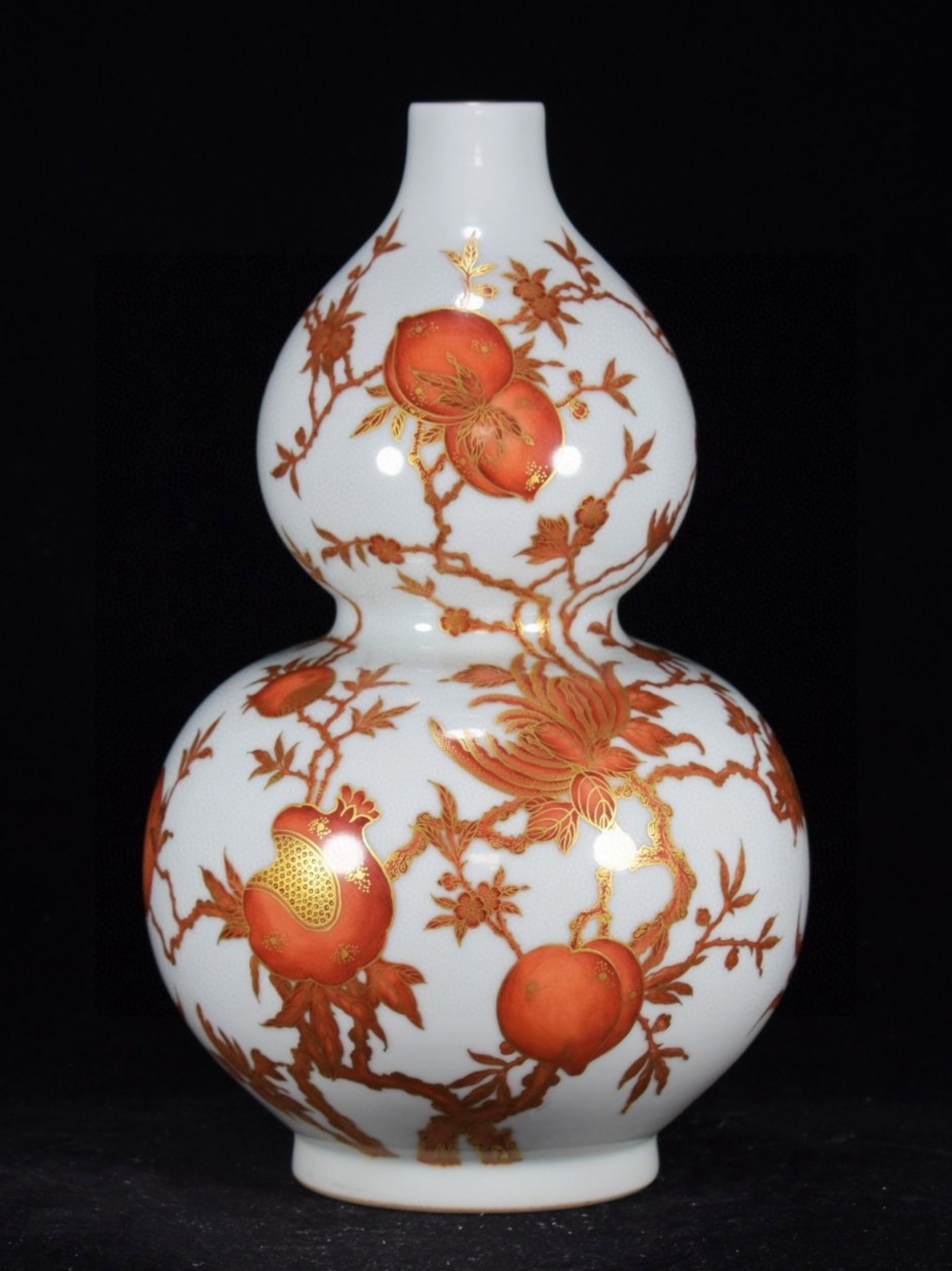 A Rare Iron-Red Painted Gold Pomegranate Pattern Gourd-Shaped Vase: A Rare Iron-Red Painted Gold Pomegranate Pattern Gourd-Shaped Vase,Qing Dynasty,China,Qianlong Six-character Mark,Size:13inx7.9in 矾红釉描金石榴纹ഽ