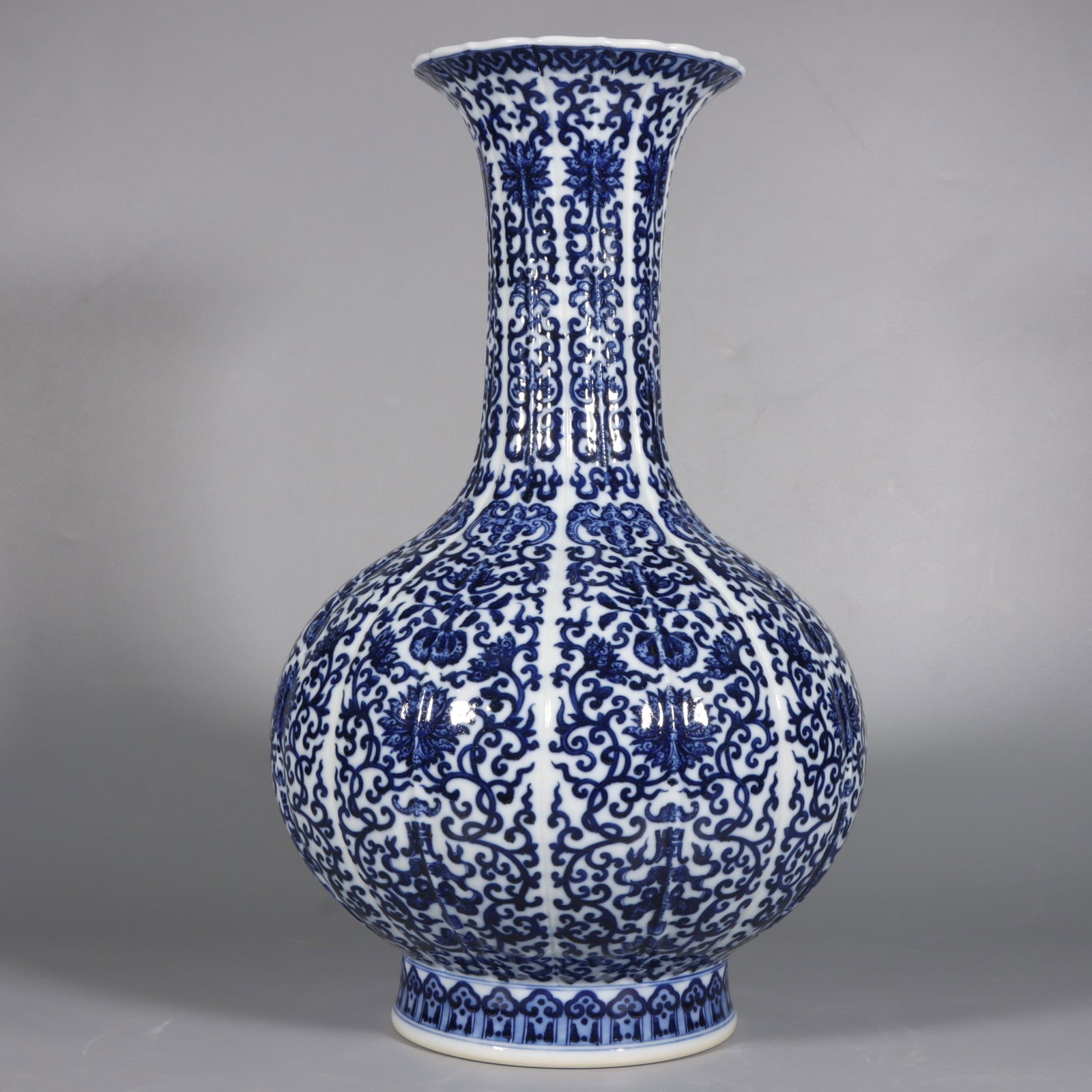 A Huge Blue and White Lotus Pattern Vase: A Huge Blue and White Lotus Pattern Vase,Qing Dynasty,China,Qianlong Six-character Mark,Size:16.1inx9.8in 青花缠枝莲纹瓶,中国清代,