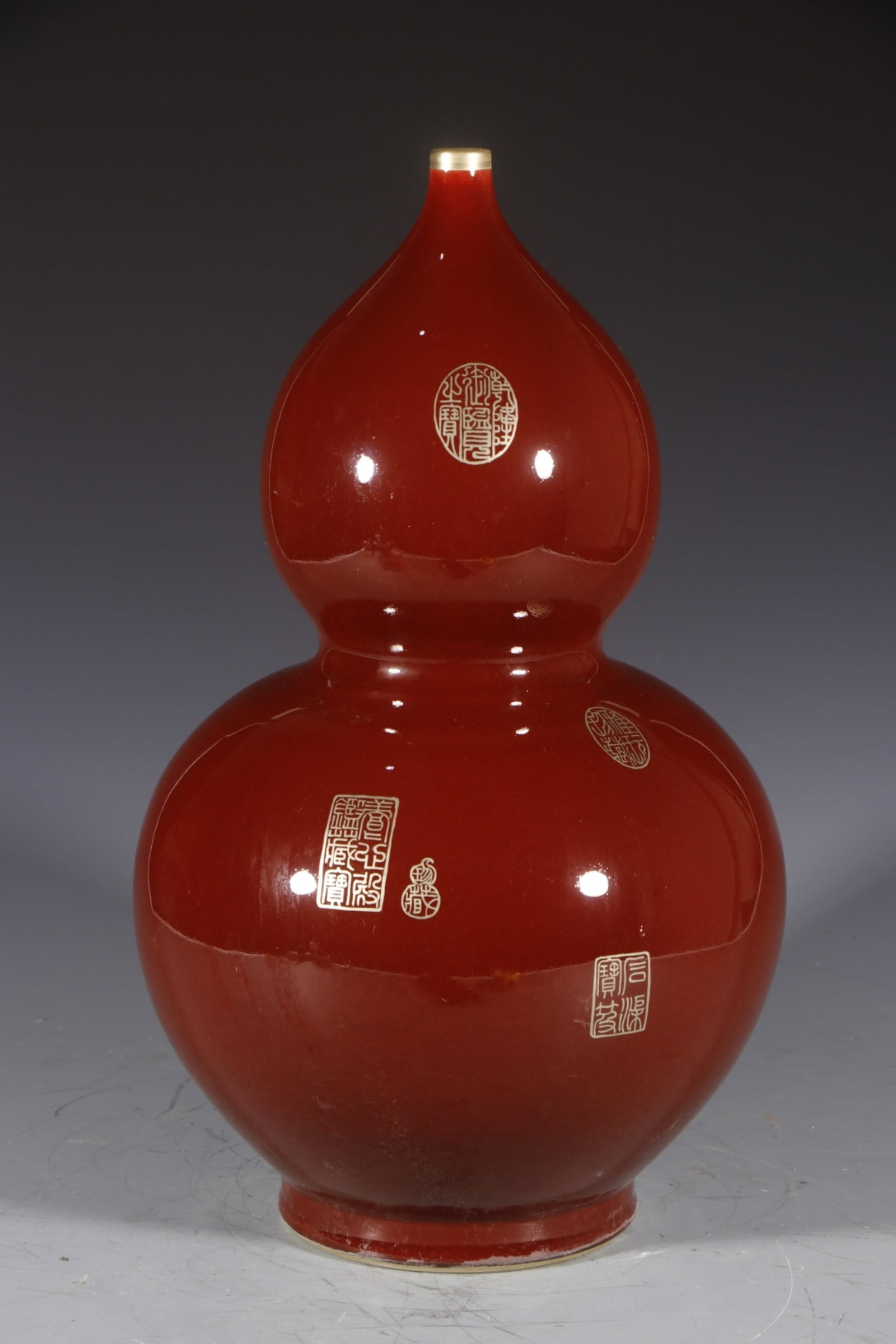 A Huge Red Glazed Gourd-Shaped Vase: A Huge Red Glazed Gourd-Shaped Vase,Qing Dynasty,China,Qianlong Six-character Mark,Size:16.5inx5.1in 红釉葫芦瓶,中国清代,乾隆六&