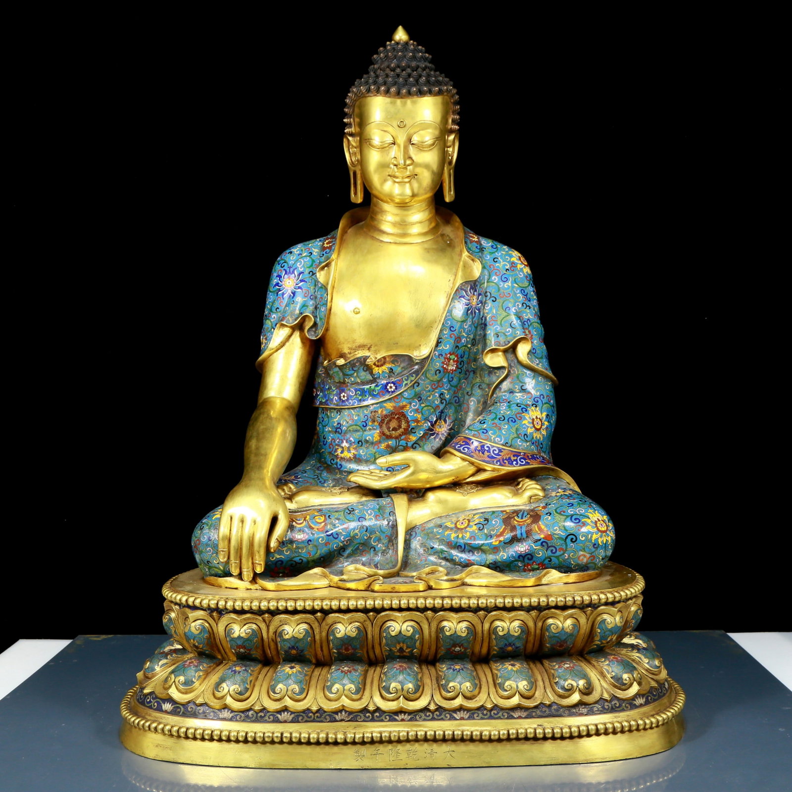 A solemn cloisonné statue of Gautama Buddha (1 of 11)