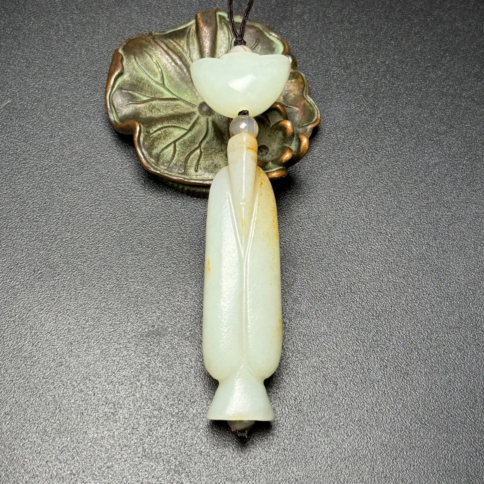 An Exquisite White Jade Pendant: An Exquisite White Jade Pendant,Qing Dynasty, China,Size:17mmx61mmx11mm,Weight:28g 白玉挂件,中国清代