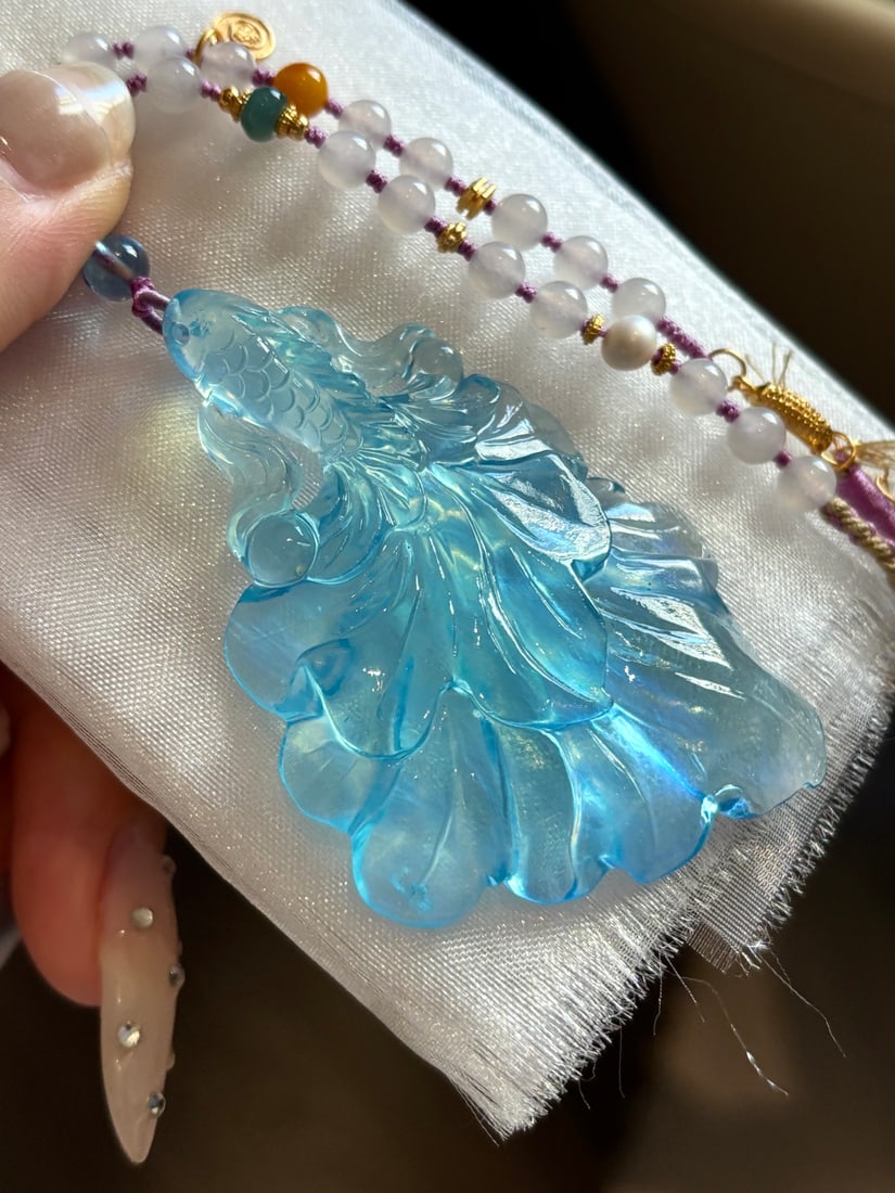 An Exquisite Aquamarine Fish Pattern Pendant: An Exquisite Aquamarine Fish Pattern Pendant,Size:65mmx42mmx10mm,Weight:31.8g 海蓝宝鱼纹挂件