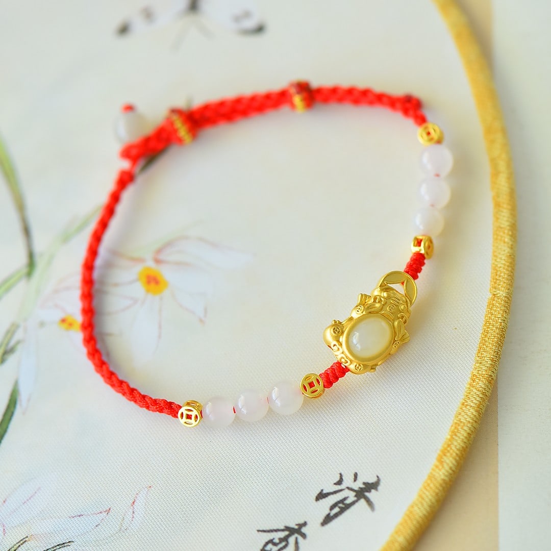 An Exquisite Sterling Silver-Gold Plated Inlaid White Jade Bracelet: An Exquisite Sterling Silver-Gold Plated Inlaid White Jade Bracelet 纯银镀金镶白玉手链