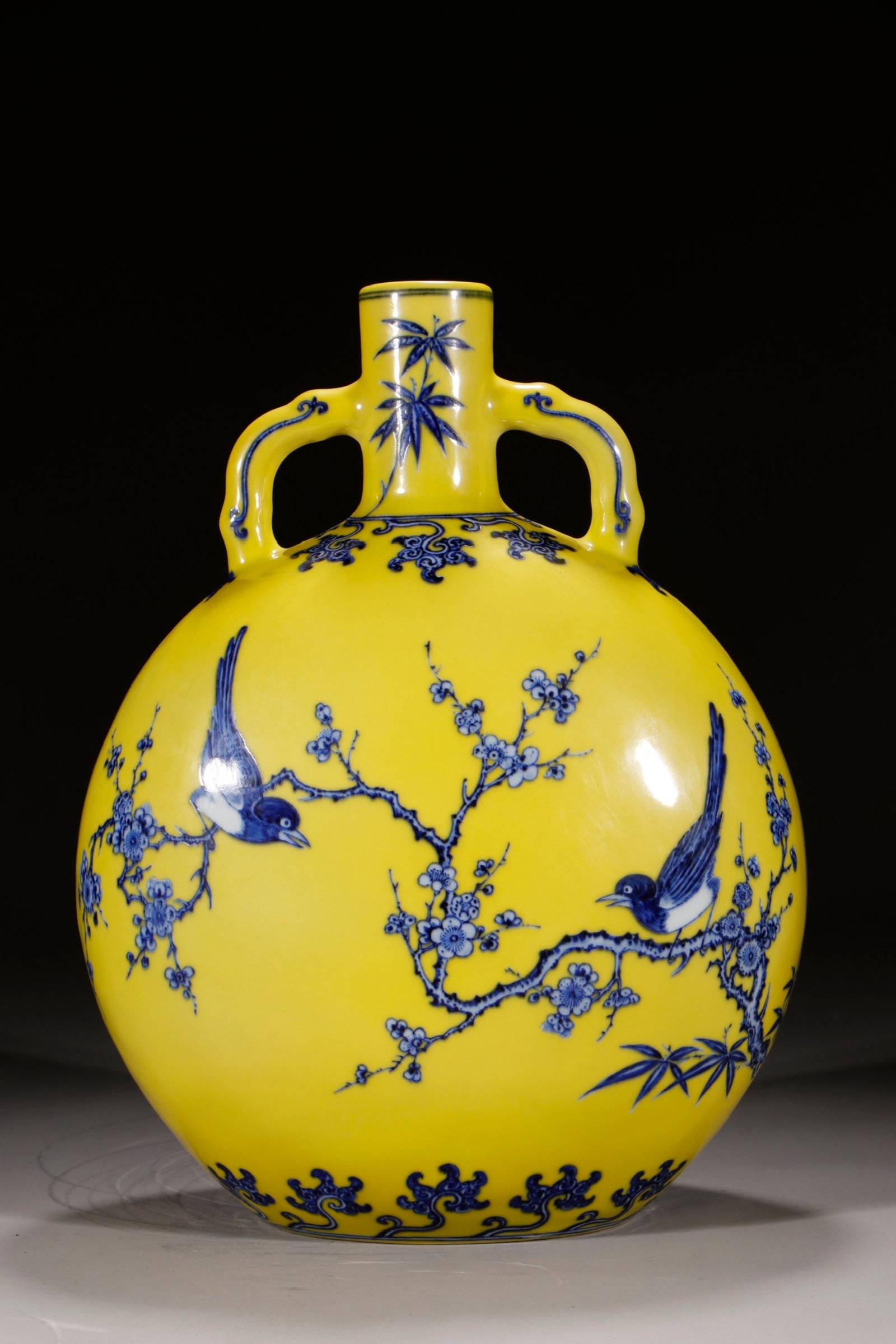 A Rare Yellow Ground Blue and White Flower and Bird Pattern Double-Ears Vase: A Rare Yellow Ground Blue and White Flower and Bird Pattern Double-Ears Vase,Qing Dynasty,China,Yongzheng Six-character Mark,Size:14.6in 黄地青花花鸟纹双