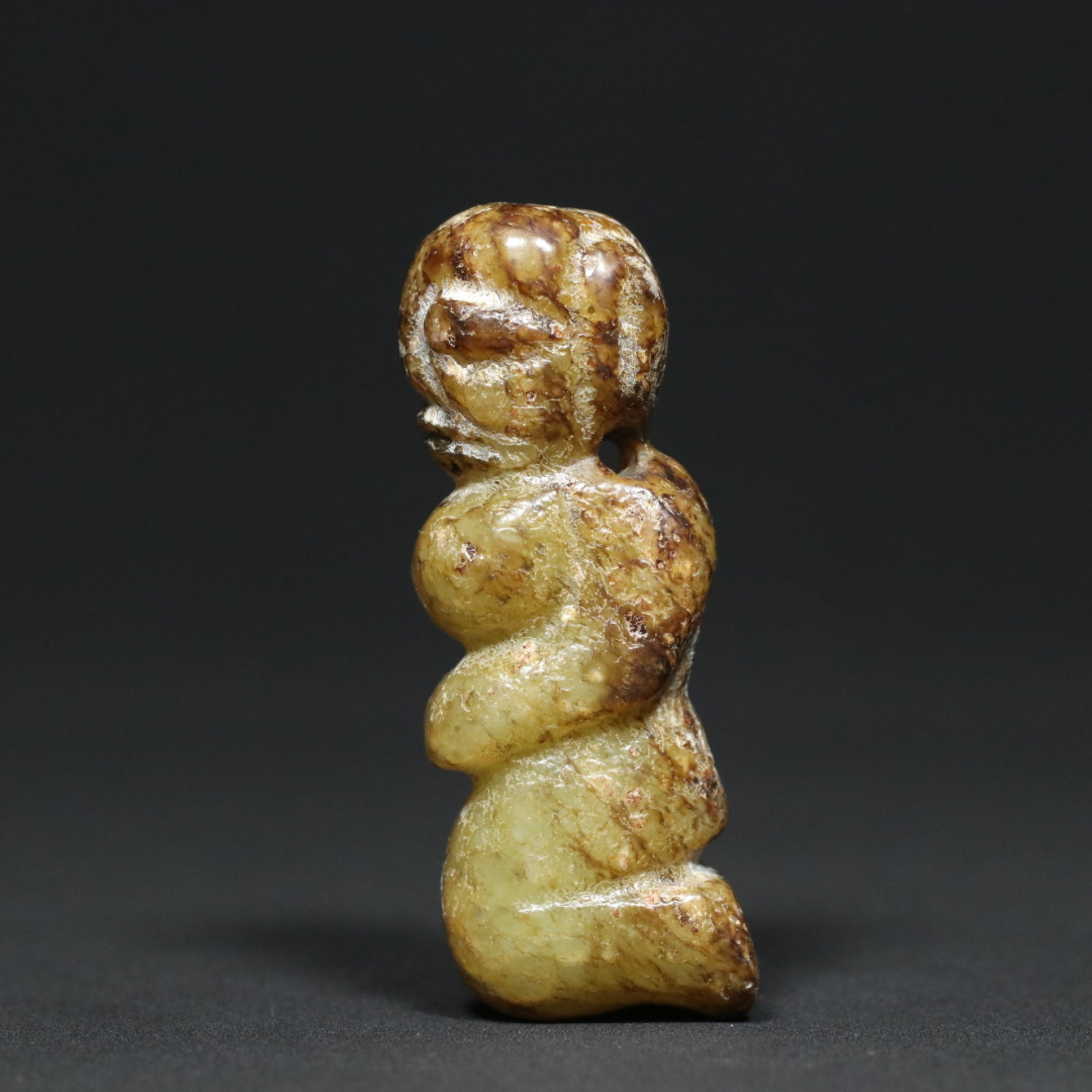 An Exquisite Archaic Jade Figure Pendant: An Exquisite Archaic Jade Figure Pendant,Ancient Time,China,Size:2.7inx1inx0.7in,Weight:48.3g 高古玉人物挂件,中国远古时期