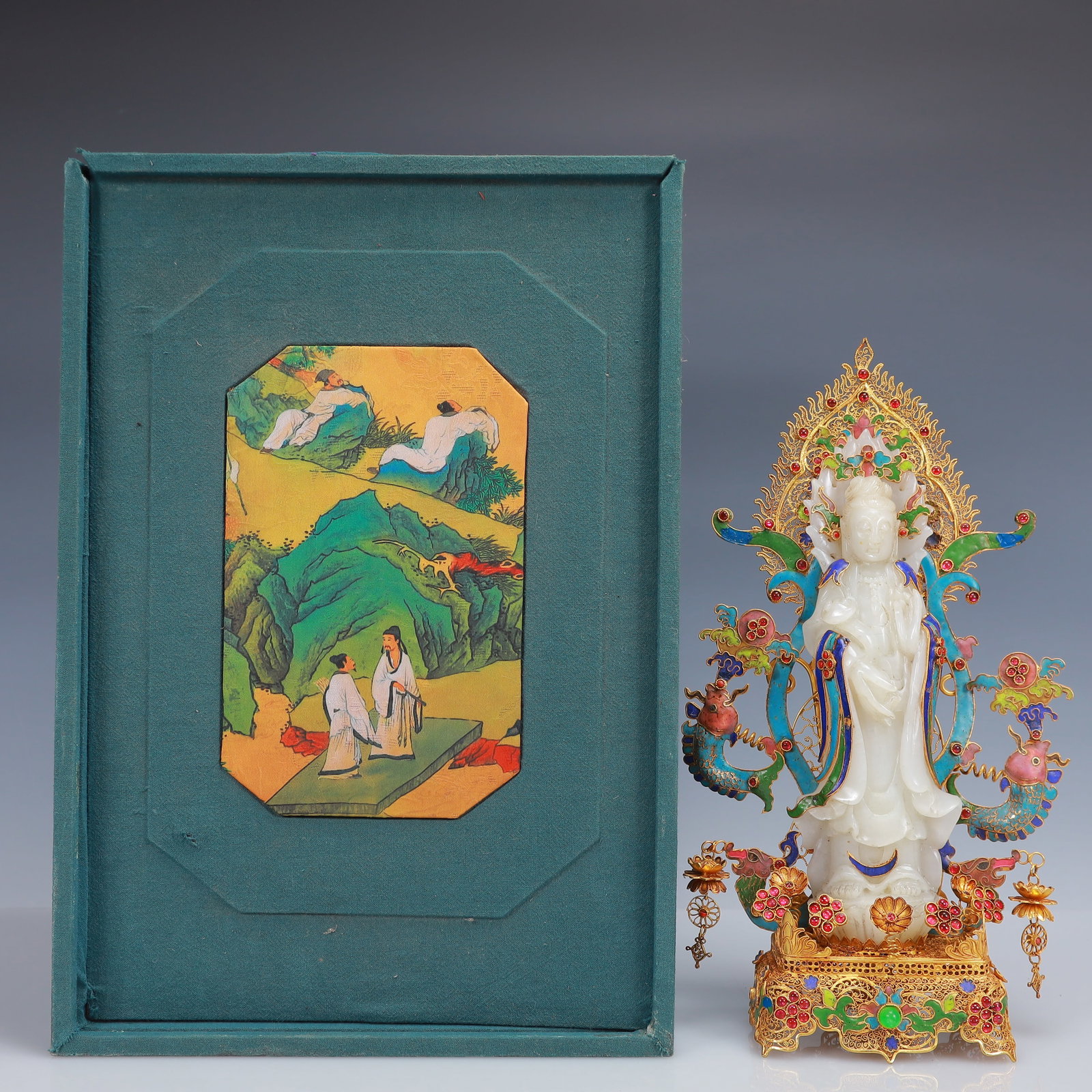 An Exquisite Filigree and Gilding Inlaid White Jade Statue of Avalokitesvara,Inlaid Gems: An Exquisite Filigree and Gilding Inlaid White Jade Statue of Avalokitesvara,Inlaid Gems,Qing Dynasty, China,Qianlong Four-Character Mark,Size:7.1inx2.8inx11.8in,(Box)15inx10.2inx6.7in,Weight:1000g &#