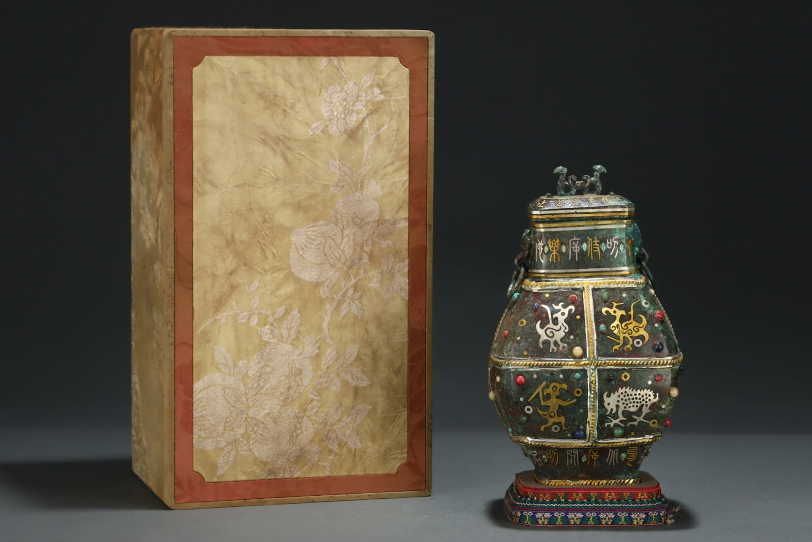 An Exquisite Bronze Inlaid Gold and Silver Auspicious Beast Pattern Beast-Ears Pot,with: An Exquisite Bronze Inlaid Gold and Silver Auspicious Beast Pattern Beast-Ears Pot,with Inscription,Inlaid Gems,Size:10.4inx6.3in,Qing Dynasty,China,with Mark 铜错金银瑞&