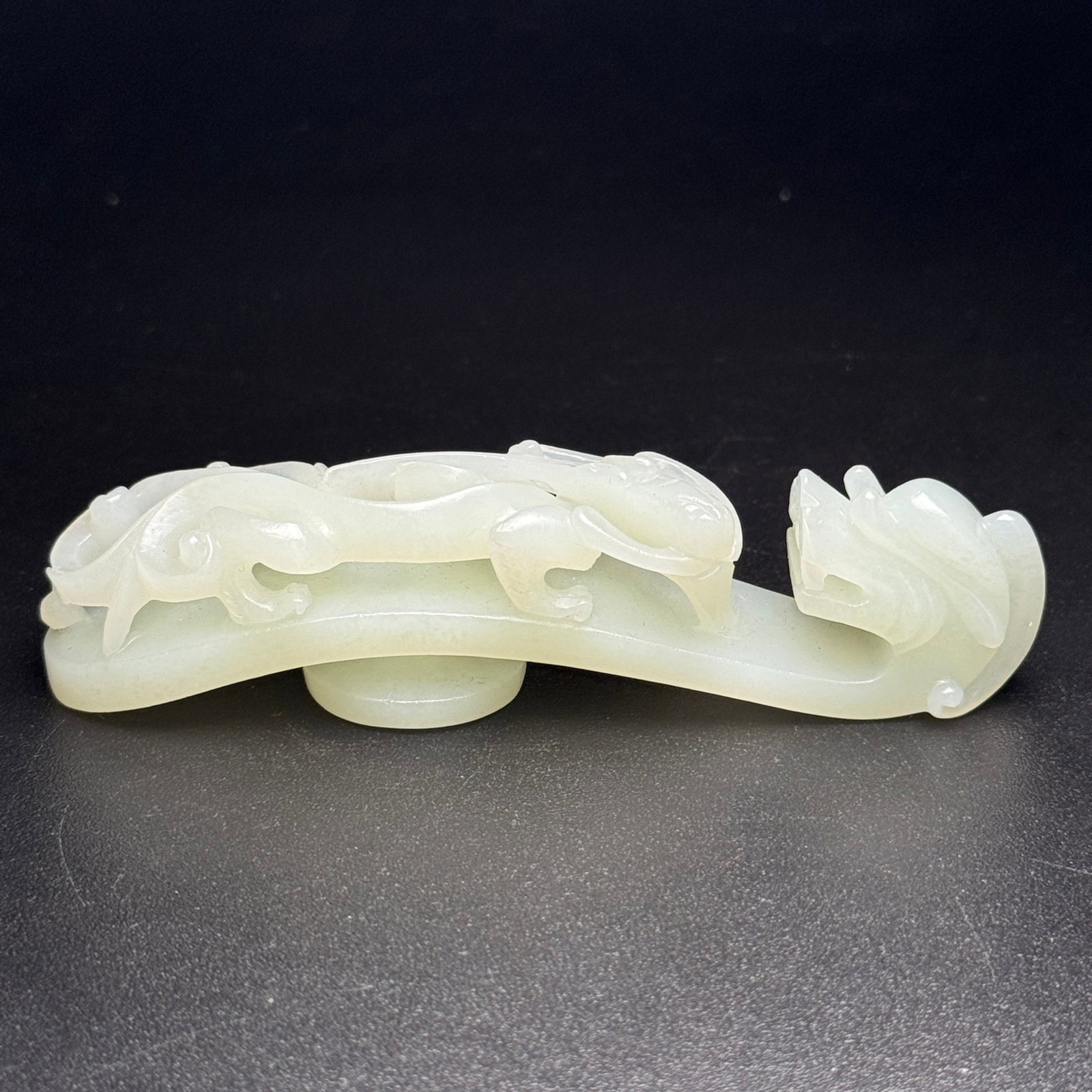 An Exquisite White Jade Chi-Dragon Pattern Ornament: An Exquisite White Jade Chi-Dragon Pattern Ornament,Qing Dynasty,China,Size:3.9inx0.9inx0.8in,Weight:53g 白玉螭龙纹摆件,中国清代