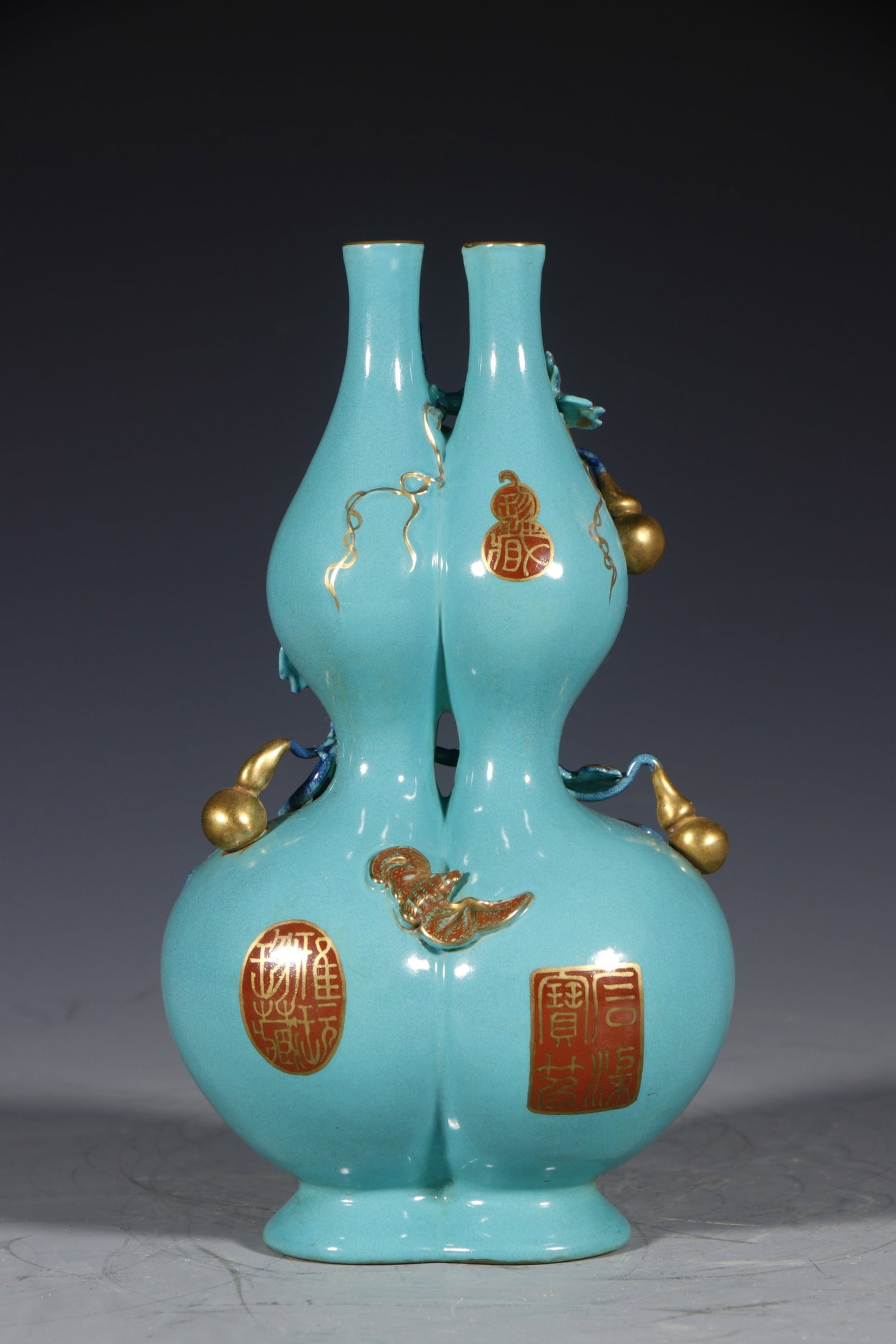 An Exquisite Turquoise Glazed Painted Gold Gourd Pattern Gourd-Shaped Vase: An Exquisite Turquoise Glazed Painted Gold Gourd Pattern Gourd-Shaped Vase,Qing Dynasty,China,Qianlong Six-character Mark,Size:8.1inx3in 松石绿釉描金葫芦