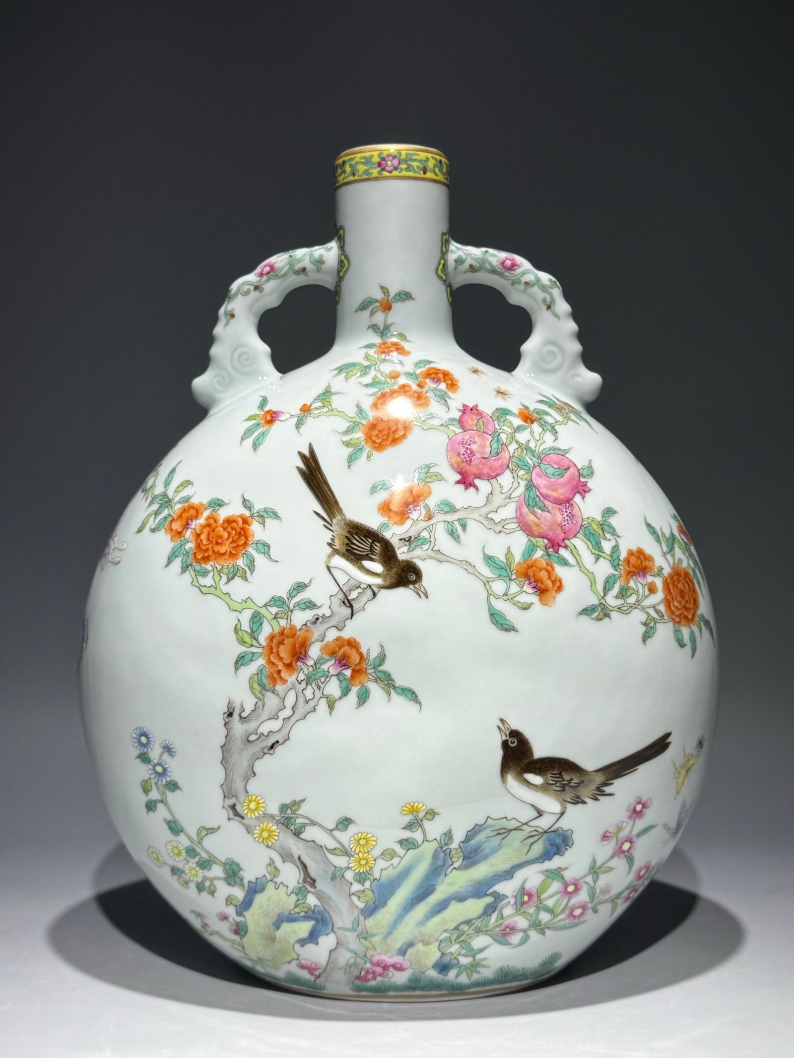 An Exquisite Famille-Rose Flower and Bird Pattern Double-Ears Vase: An Exquisite Famille-Rose Flower and Bird Pattern Double-Ears Vase,Qing Dynasty,China,Qianlong Six-character Mark,Size:14.6inx11.4in 粉彩花鸟纹双耳瓶,&#