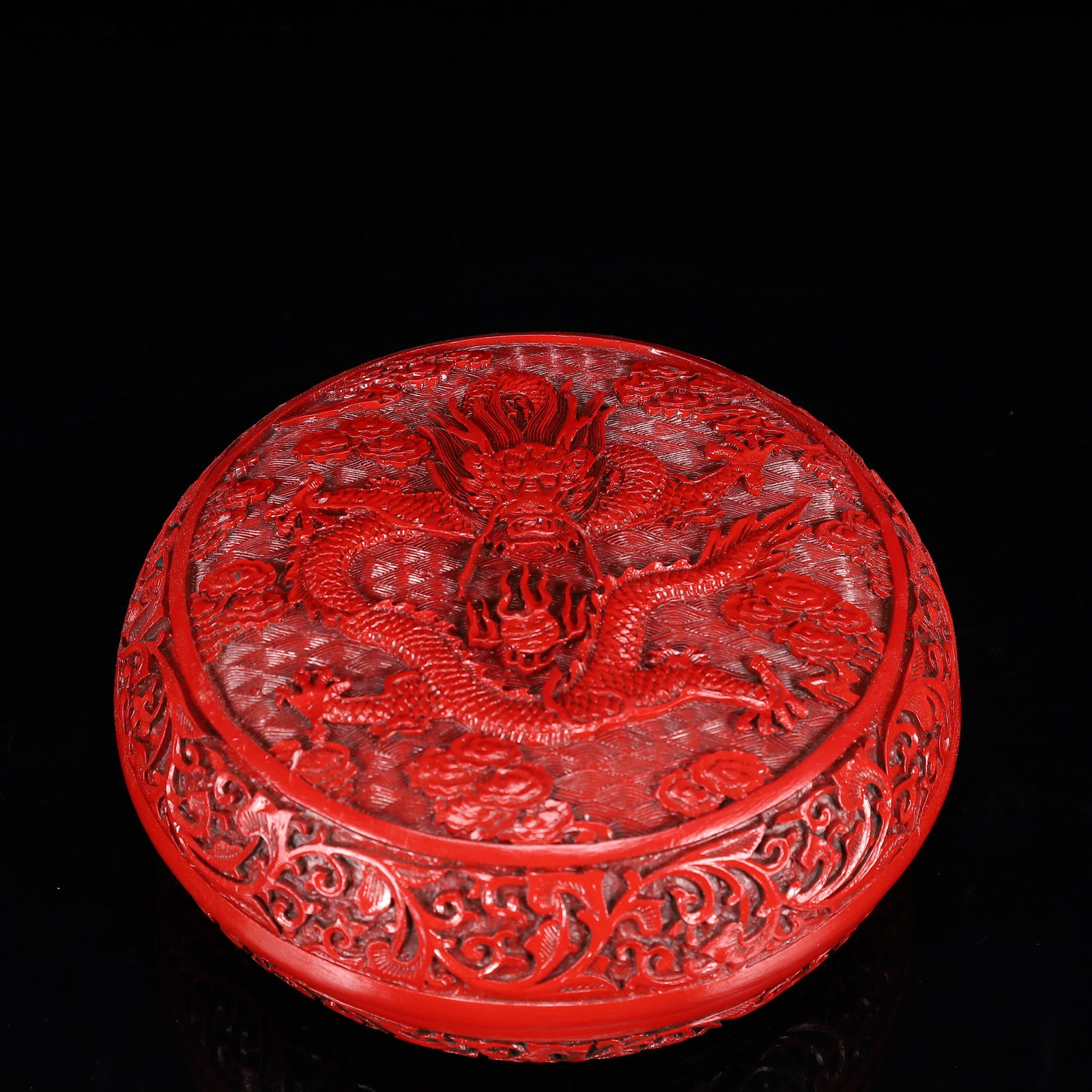 An Exquisite Carved Red Lacquer Auspicious Cloud and Dragon Pattern Box with Cover: An Exquisite Carved Red Lacquer Auspicious Cloud and Dragon Pattern Box with Cover,Qing Dynasty, China,Qianlong Four-character Mark,Size:7.9inx3.5in,Weight:800g 剔红漆器祥