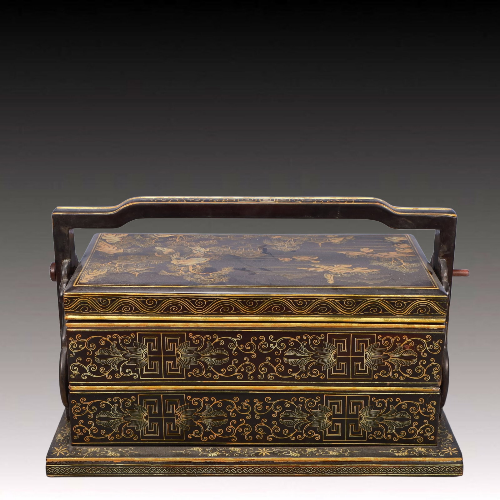 A Rare Wooden Lacquer Painted Gold Landscape Pattern Box: A Rare Wooden Lacquer Painted Gold Landscape Pattern Box,Qing Dynasty, China,Size:15inx8.7inx9.4in,Weight:2700g 木胎漆器描金山水纹提盒