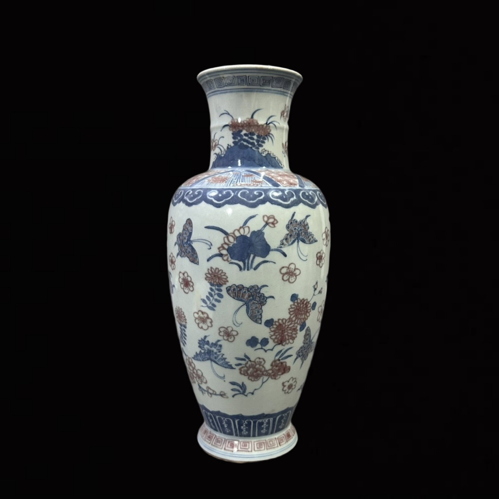 An Exquisite Blue and White Underglaze-Red Flower and Butterfly Pattern Vase: An Exquisite Blue and White Underglaze-Red Flower and Butterfly Pattern Vase,Qing Dynasty,China,Size:9.8inx3.9in 青花釉里红花卉蝴蝶纹瓶