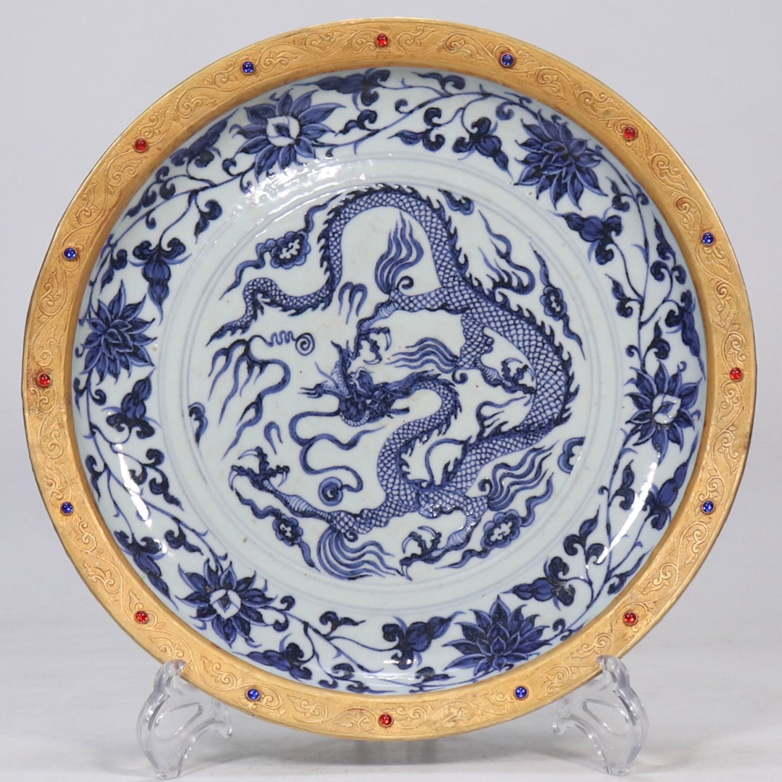 An Exquisite Blue and White Auspicious Cloud and Dragon Pattern Plate,Inlaid Gems: An Exquisite Blue and White Auspicious Cloud and Dragon Pattern Plate,Inlaid Gems,Yuan Dynasty,China,Size:2.4inx12.8in 青花祥云龙纹盘,嵌宝石