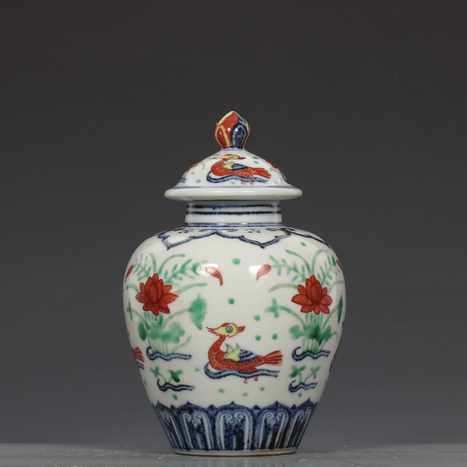 An Exquisite Blue and White Wucai Flower and Mandarin Duck Pattern Jar with Cover: An Exquisite Blue and White Wucai Flower and Mandarin Duck Pattern Jar with Cover,Ming Dynasty,China ,Xuande Six-character Mark,Size:7.7inx4.7in 青花五彩花卉鸳