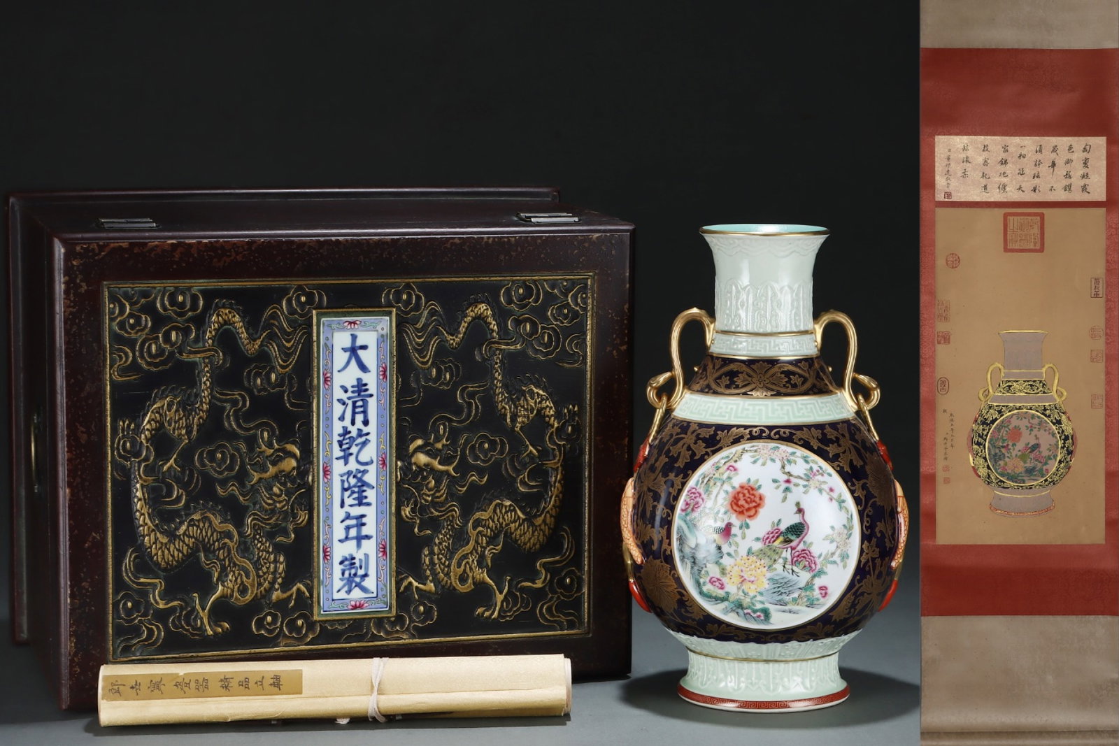 A Huge Ji Blue Glazed Famille-Rose Painted Gold Flower and Bird Pattern Double-Ears Vase,with: A Huge Ji Blue Glazed Famille-Rose Painted Gold Flower and Bird Pattern Double-Ears Vase,with Chinese Vertical Scroll Ink Painting on Silk,Qing Dynasty,China,Qianlong Six-Character Mark,Size:(Without 