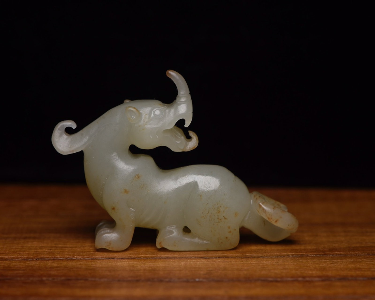 An Exquisite White Jade Beast Ornament: An Exquisite White Jade Beast Ornament,Qing Dynasty,China,Size:2.6inx1.9inx0.6in,Weight:38g 白玉兽摆件,中国清代
