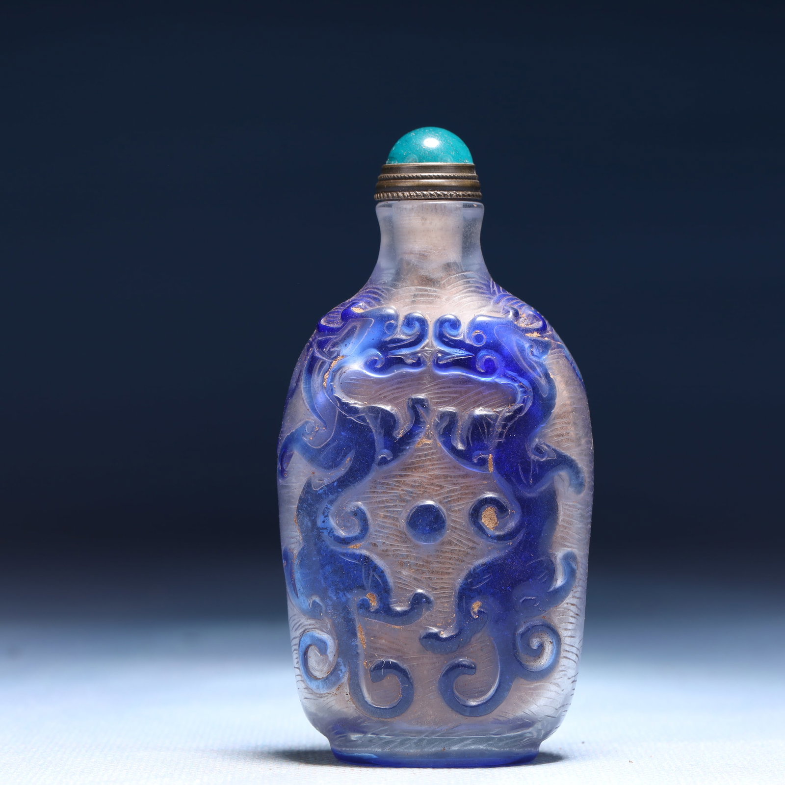 An Exquisite Glass Chi-Dragon Pattern Snuff Bottle: An Exquisite Glass Chi-Dragon Pattern Snuff Bottle,Qing Dynasty,China,Daoguang Four-character Mark,Size:1.6inx0.8inx3.3in,Weight:62g 琉璃螭龙纹鼻烟壶,&#