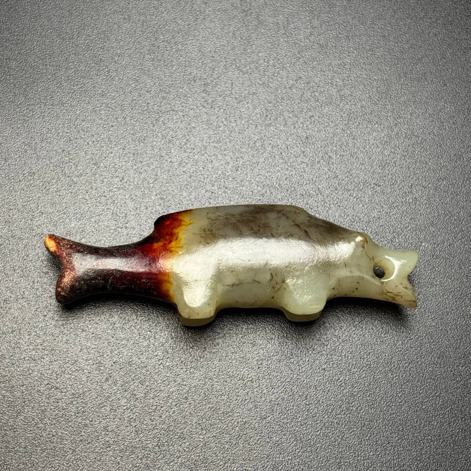 An Exquisite White Jade Fish Ornament: An Exquisite White Jade Fish Ornament,Qing Dynasty,China,Size:2.9inx0.9inx0.6in,Weight:30g 白玉鱼摆件,中国清代