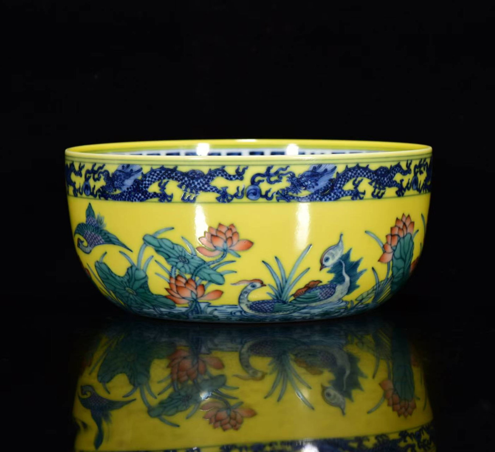 An Exquisite Yellow Glazed Blue and White Flower and Mandarin Duck Pattern Bowl: An Exquisite Yellow Glazed Blue and White Flower and Mandarin Duck Pattern Bowl,Qing Dynasty,China,Qianlong Six-Character Mark,Size:3inx6.7in 黄釉青花花卉鸳&#