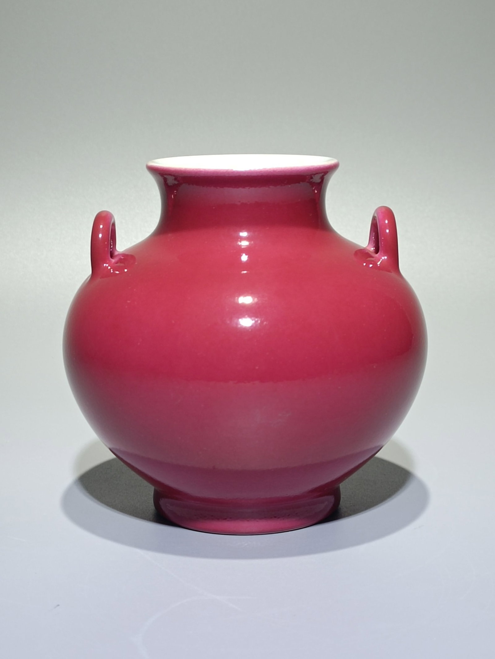 An Exquisite Ruby Red-Glazed Double-Ears Jar: An Exquisite Ruby Red-Glazed Double-Ears Jar,Qing Dynasty,China,Qianlong Six-character Mark,Size:4.6inx4.6in 胭脂红双耳罐,中国清代,乾&