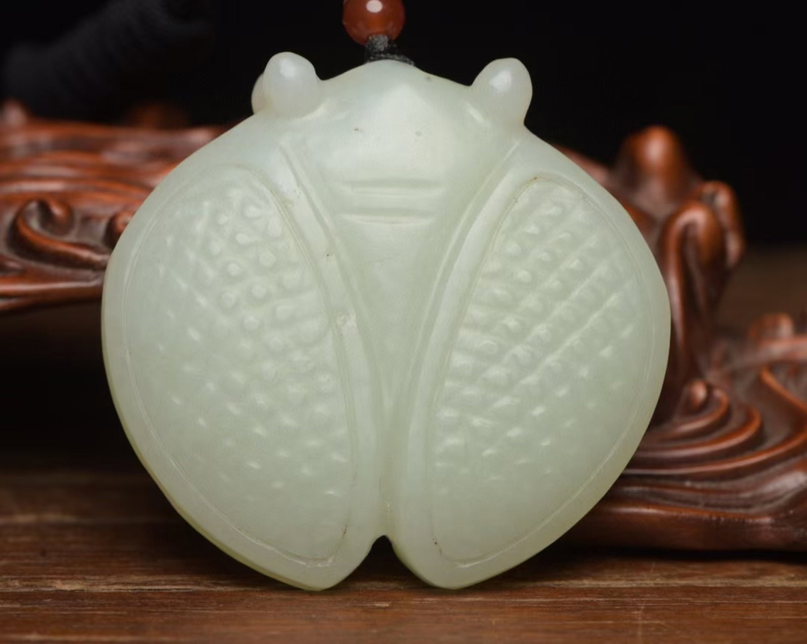 An Exquisite White Jade Cicada Pendant: An Exquisite White Jade Cicada Pendant,Qing Dynasty,China,Size:2.1inx2inx0.5in,Weight:70g 白玉蝉挂件,中国清代