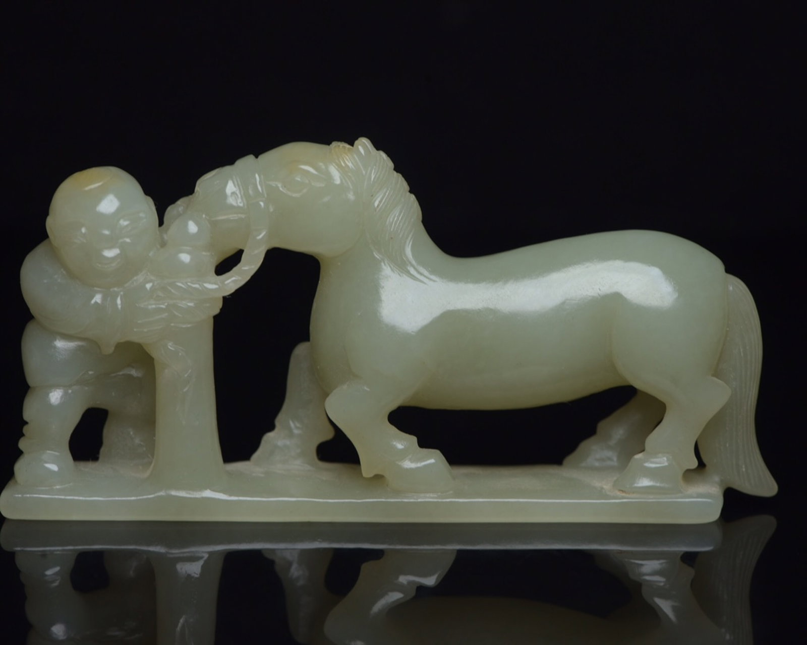 An Exquisite White Jade Figure Riding Horse Ornament: An Exquisite White Jade Figure Riding Horse Ornament,Qing Dynasty,China,Size:3.9inx1.9inx0.7in,Weight:102g 白玉人物骑马摆件,中国清