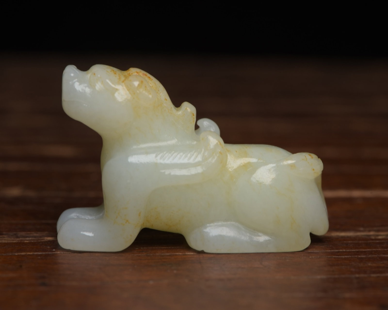 An Exquisite White Jade Beast Ornament: An Exquisite White Jade Beast Ornament,Qing Dynasty,China,Size:2inx1.3inx0.7in,Weight:41g 白玉兽摆件,中国清代