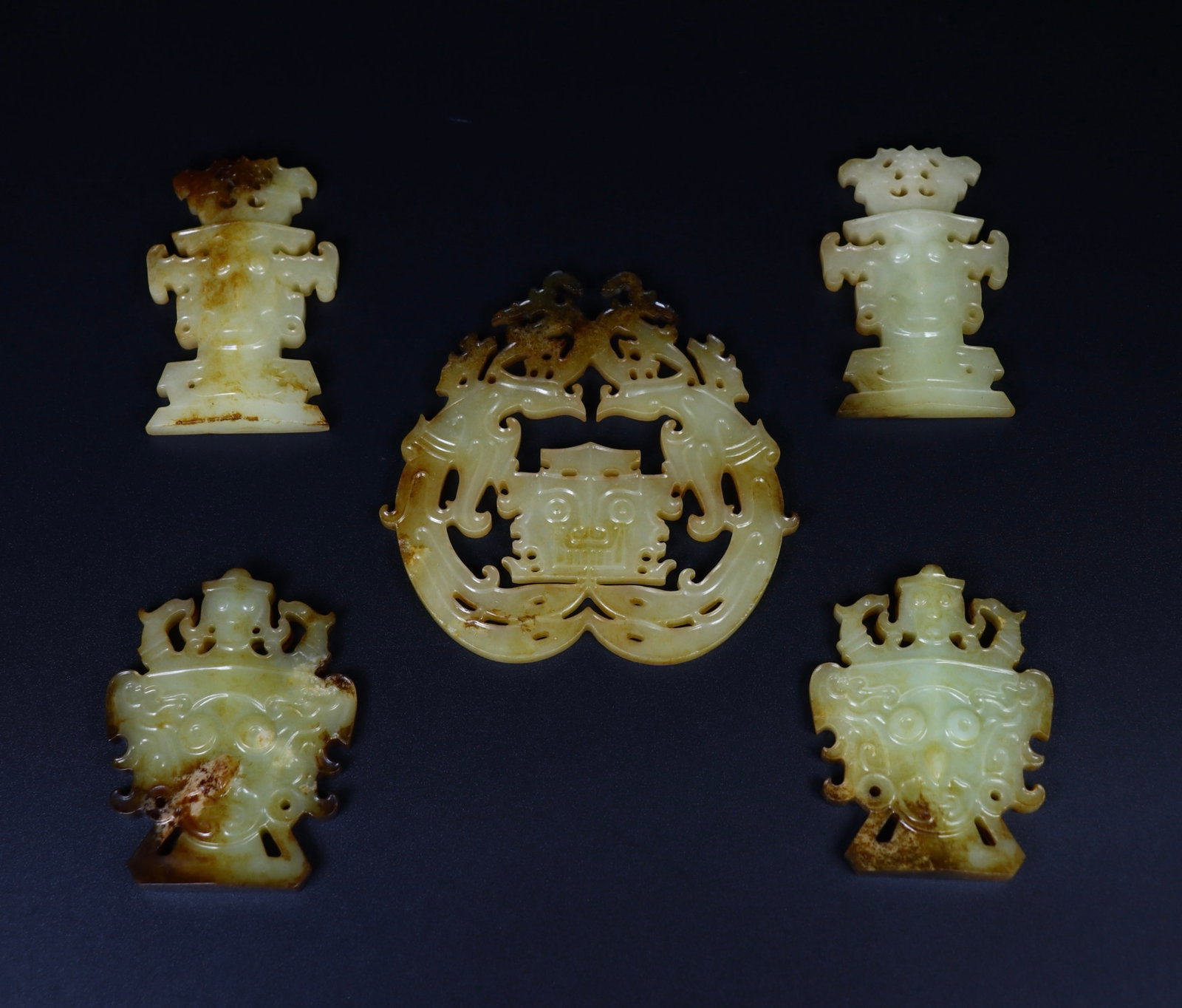 A Set of Fine White Jade Beast-Face Pattern Ornaments: A Set of Fine White Jade Beast-Face Pattern Ornaments,Qing Dynasty,China,Size:4.1inx4.1inx0.2in,Weight:327g 一套白玉兽面纹摆件,中国