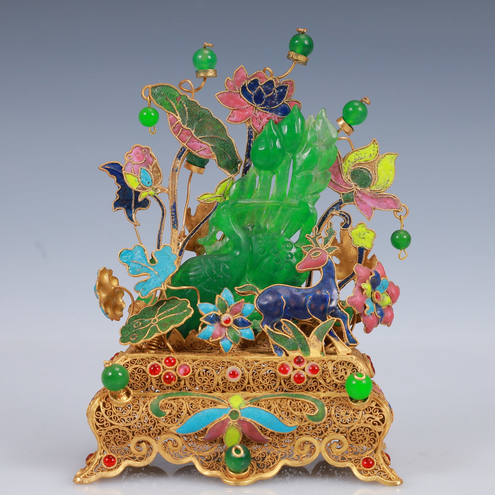 An Exquisite Filigree and Gilding Inlaid Jadeite Lotus Ornament,Inlaid Gems: An Exquisite Filigree and Gilding Inlaid Jadeite Lotus Ornament,Inlaid Gems,Qing Dynasty, China,Qianlong Four-Character Mark,Size:4.3inx2.8inx6.7in,Weight:326g 花丝鎏金嵌