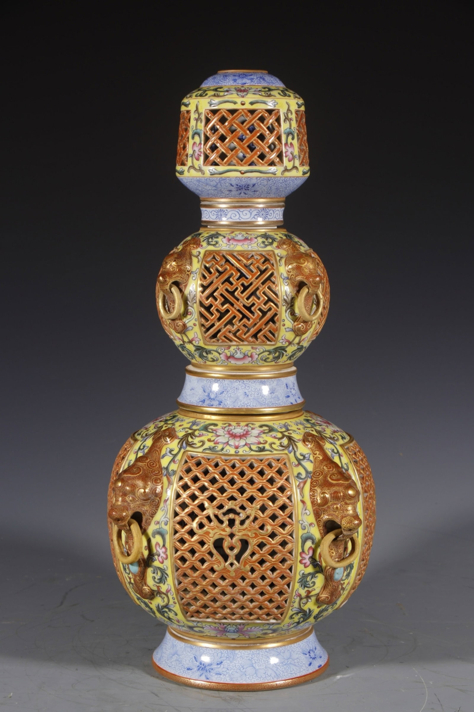 An Exquisite Yellow Ground Enamel Lotus Pattern Gourd-Shaped Vase: An Exquisite Yellow Ground Enamel Lotus Pattern Gourd-Shaped Vase,Qing Dynasty,China,Qianlong Six-character Mark,Size:15.4inx4.3in 黄地珐琅彩缠枝莲ń